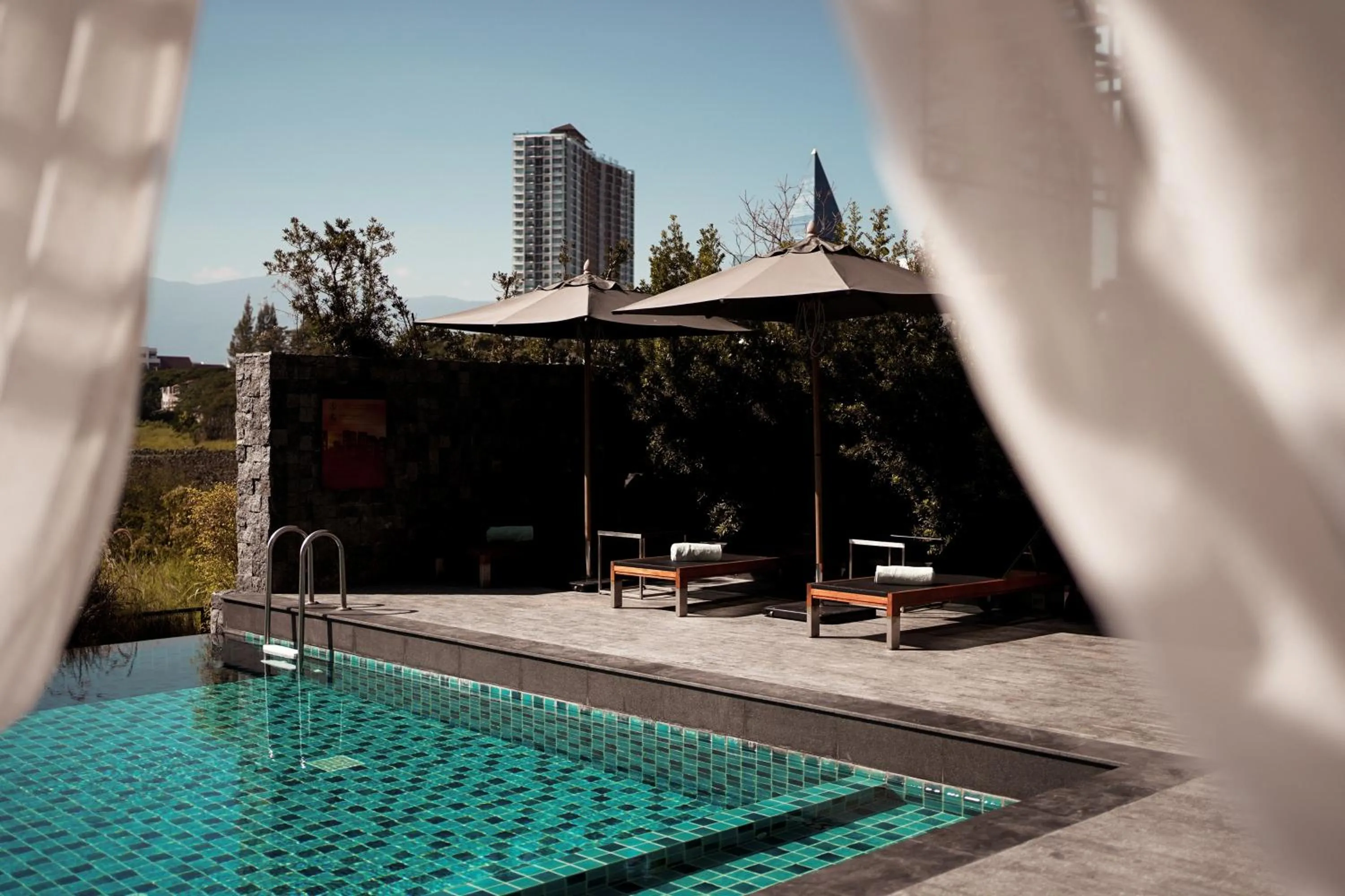 Swimming pool in Brique Hotel Chiangmai