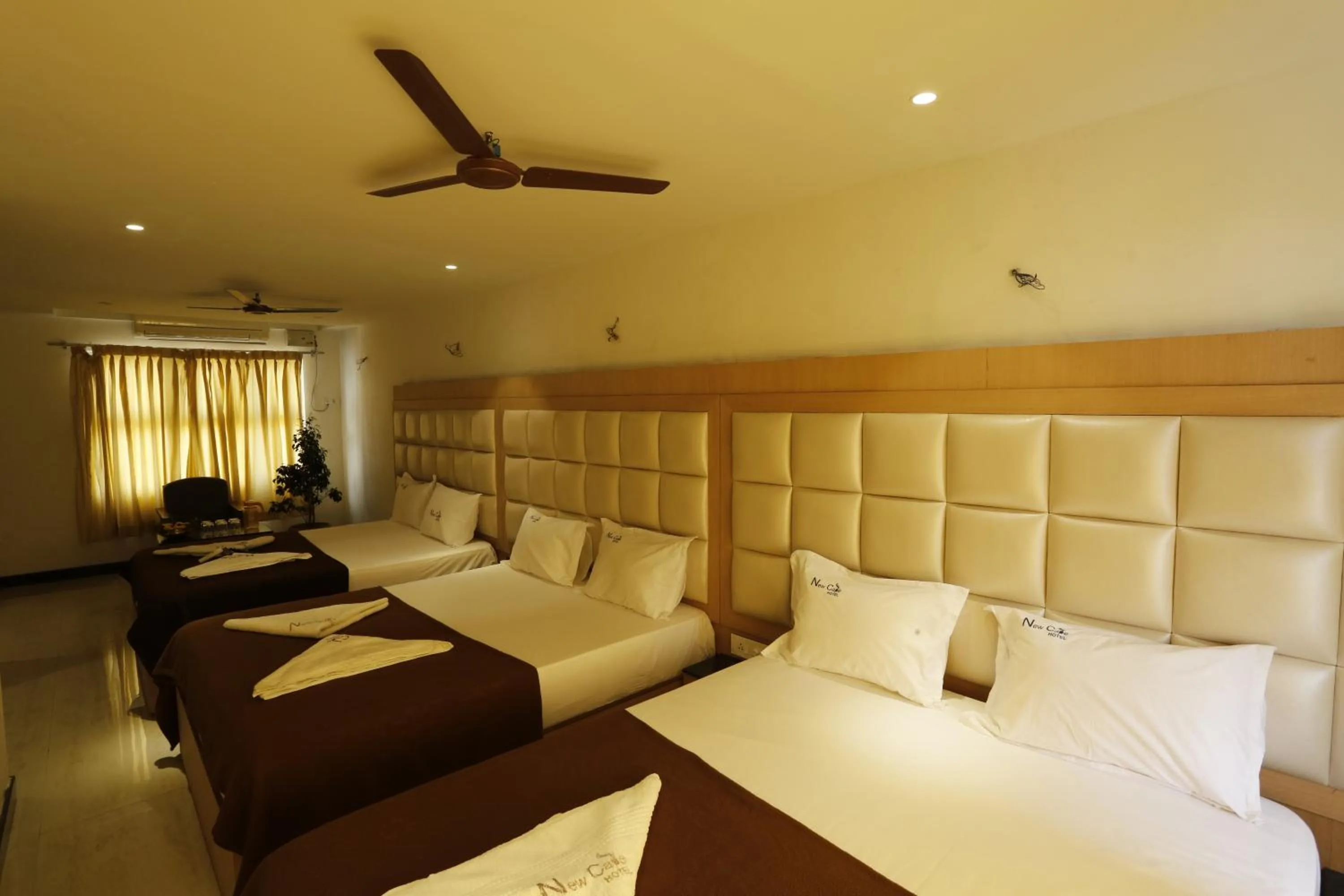 Bed in New Cape Hotel