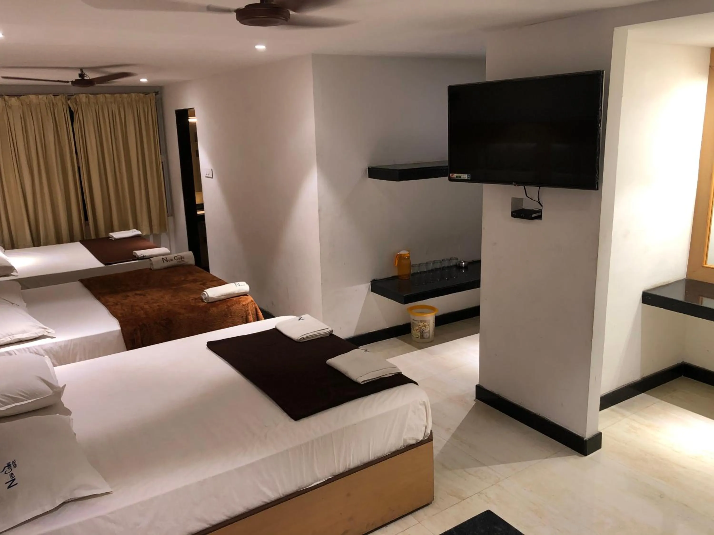 Bed in New Cape Hotel