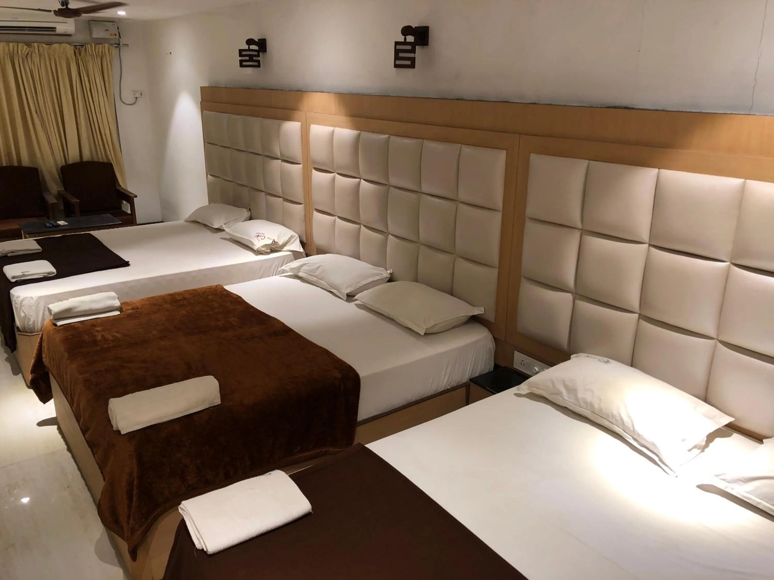 Bed in New Cape Hotel