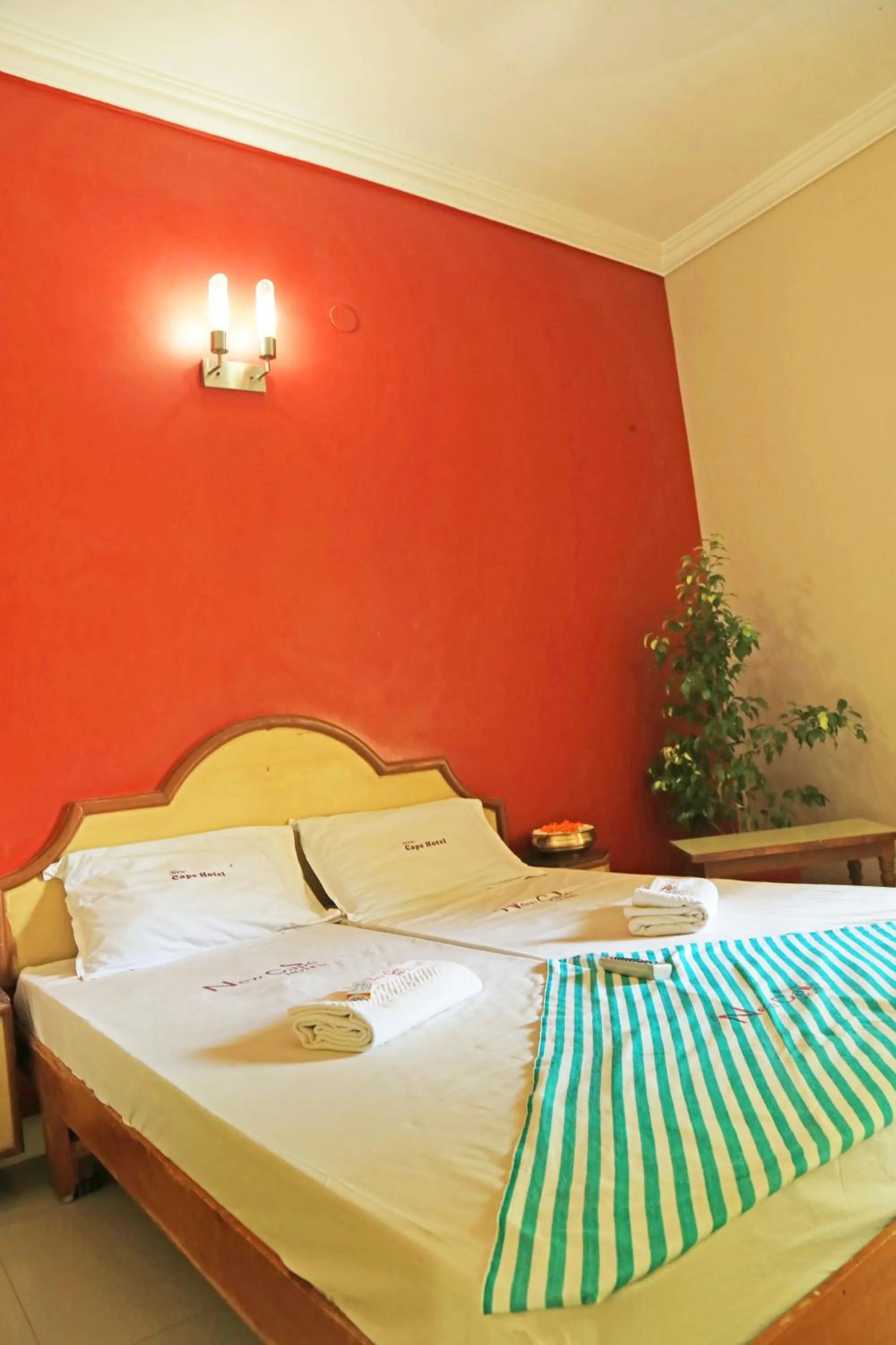Bed in New Cape Hotel