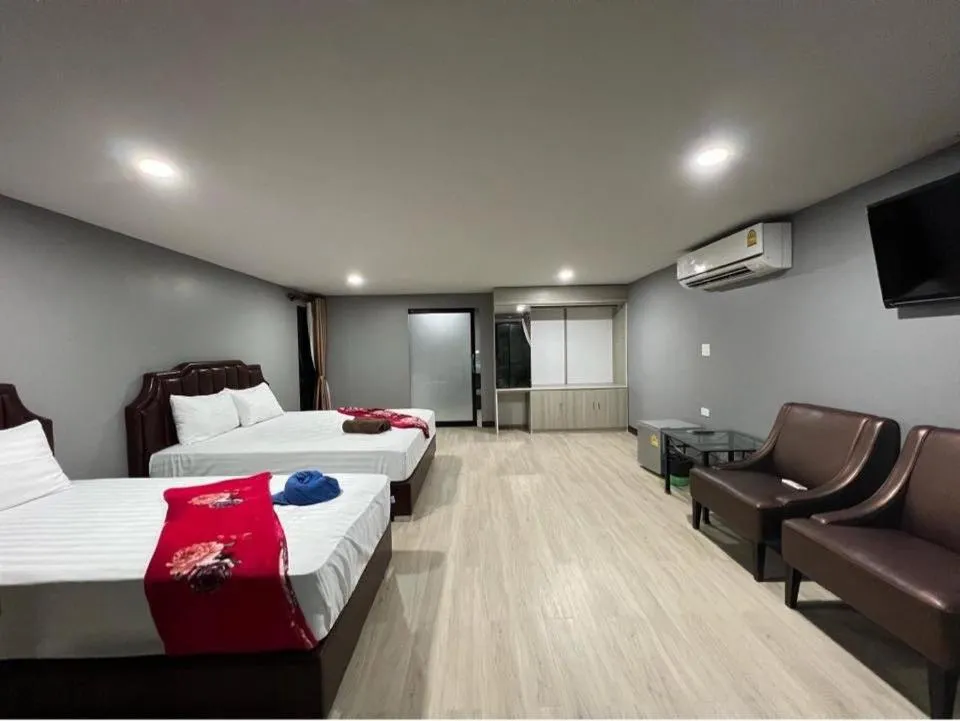 Photo of the whole room, Bed in Chomview Resort