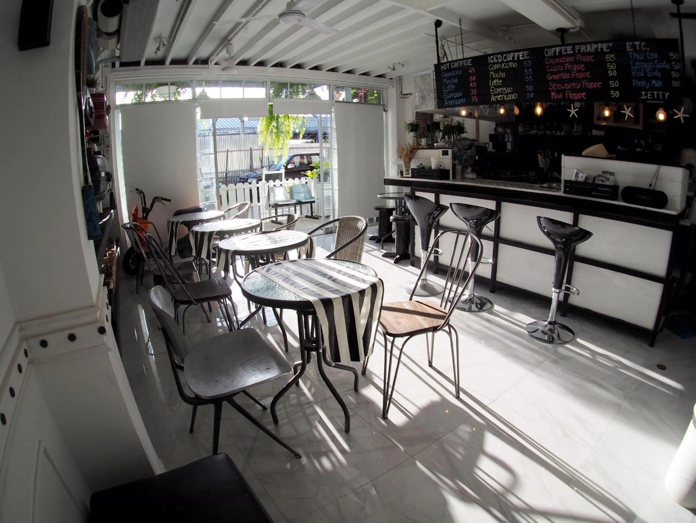 Communal lounge/ TV room in Jetty Huahin Hostel