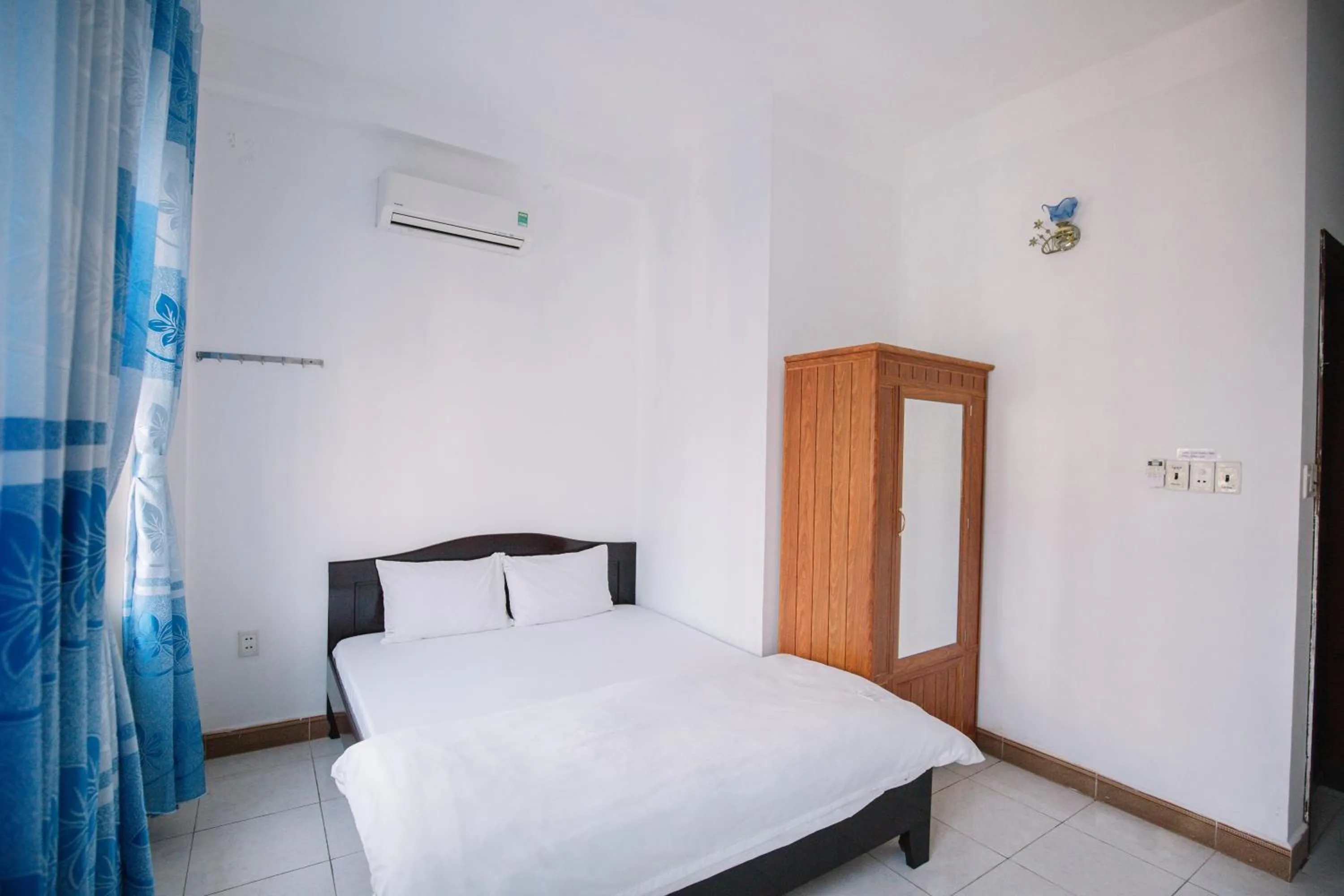 Bedroom, Bed in Lum Dong Tien Hotel