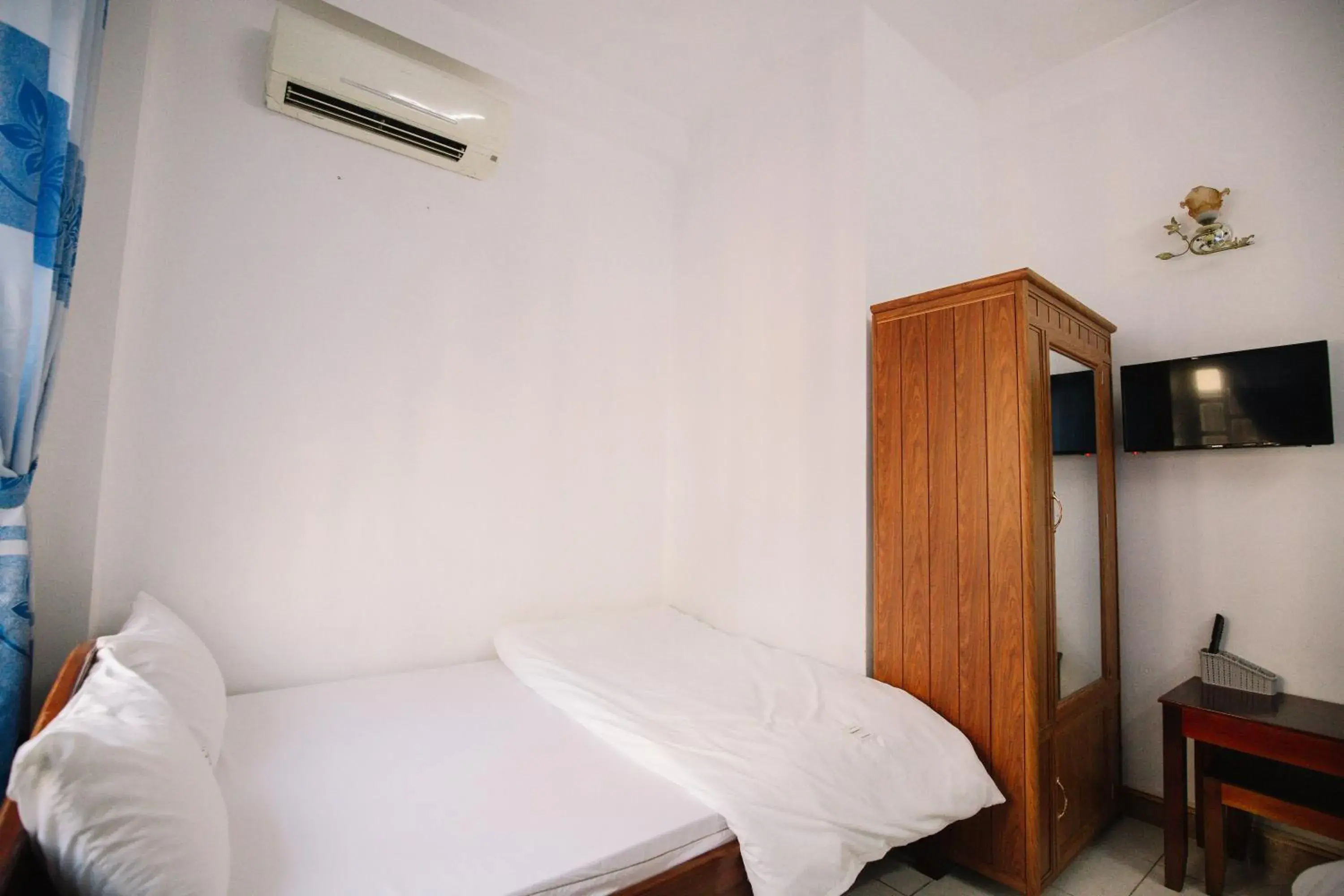 Economy Triple Room in Lum Dong Tien Hotel Economy Triple Room in Lum Dong Tien Hotel