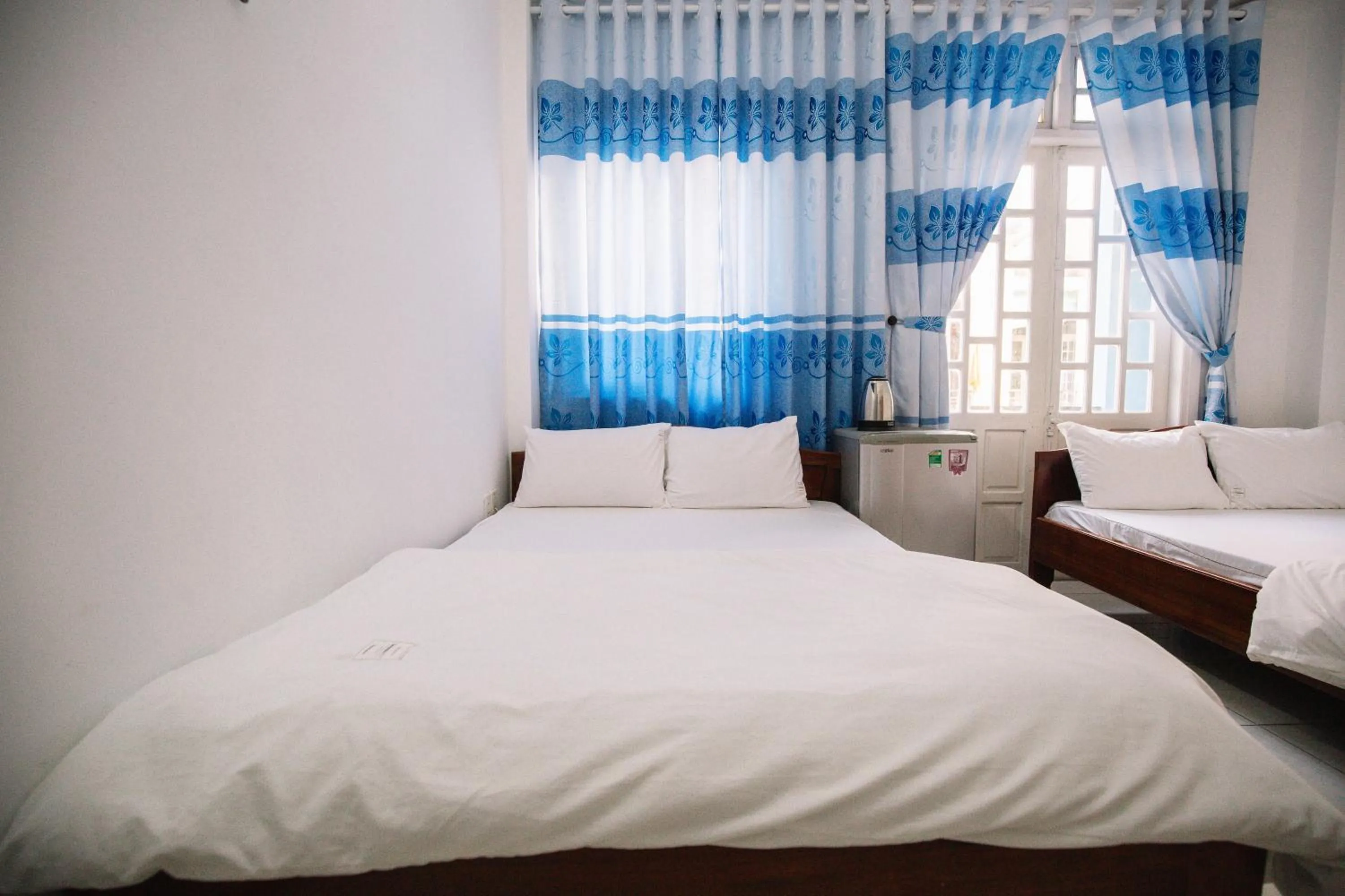 Bedroom, Bed in Lum Dong Tien Hotel