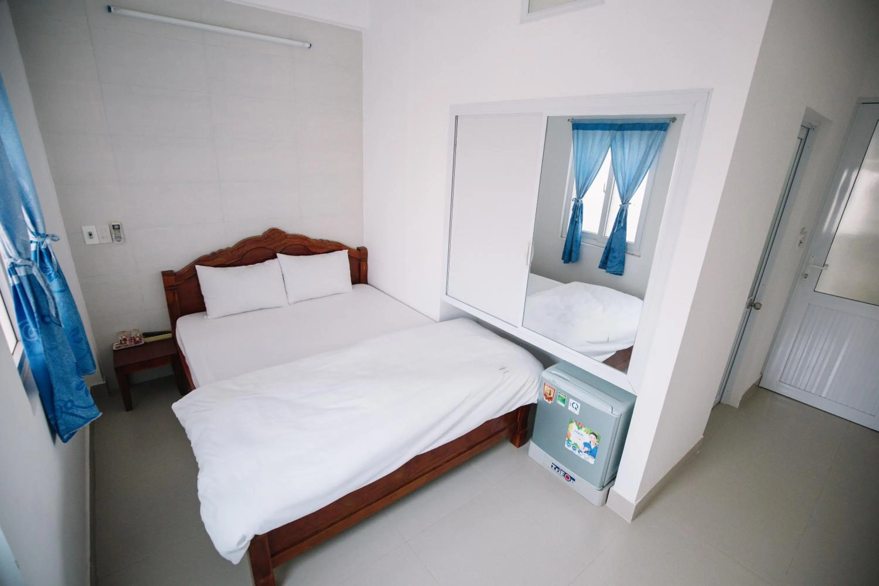 Bedroom, Bed in Lum Dong Tien Hotel