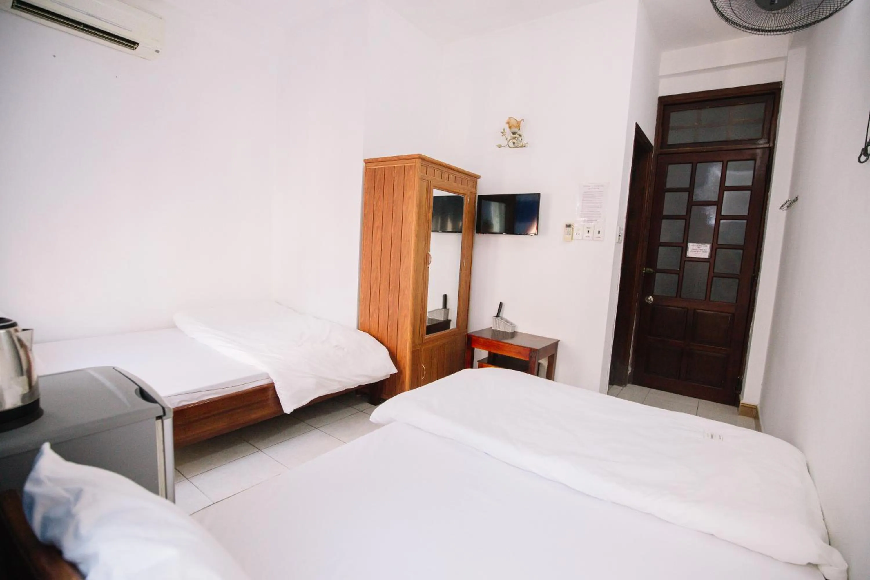 Bedroom, Bed in Lum Dong Tien Hotel