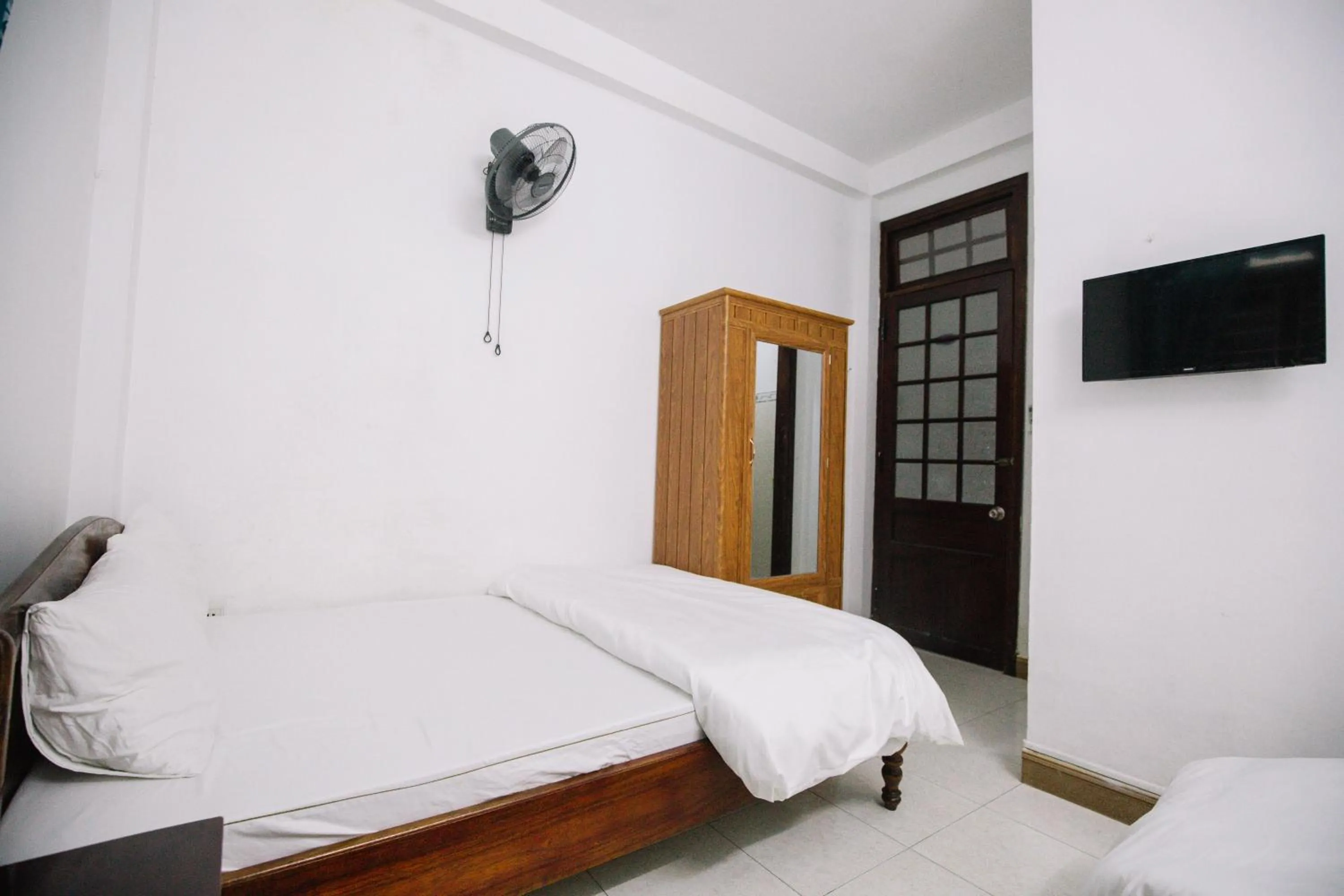 Bedroom, Bed in Lum Dong Tien Hotel