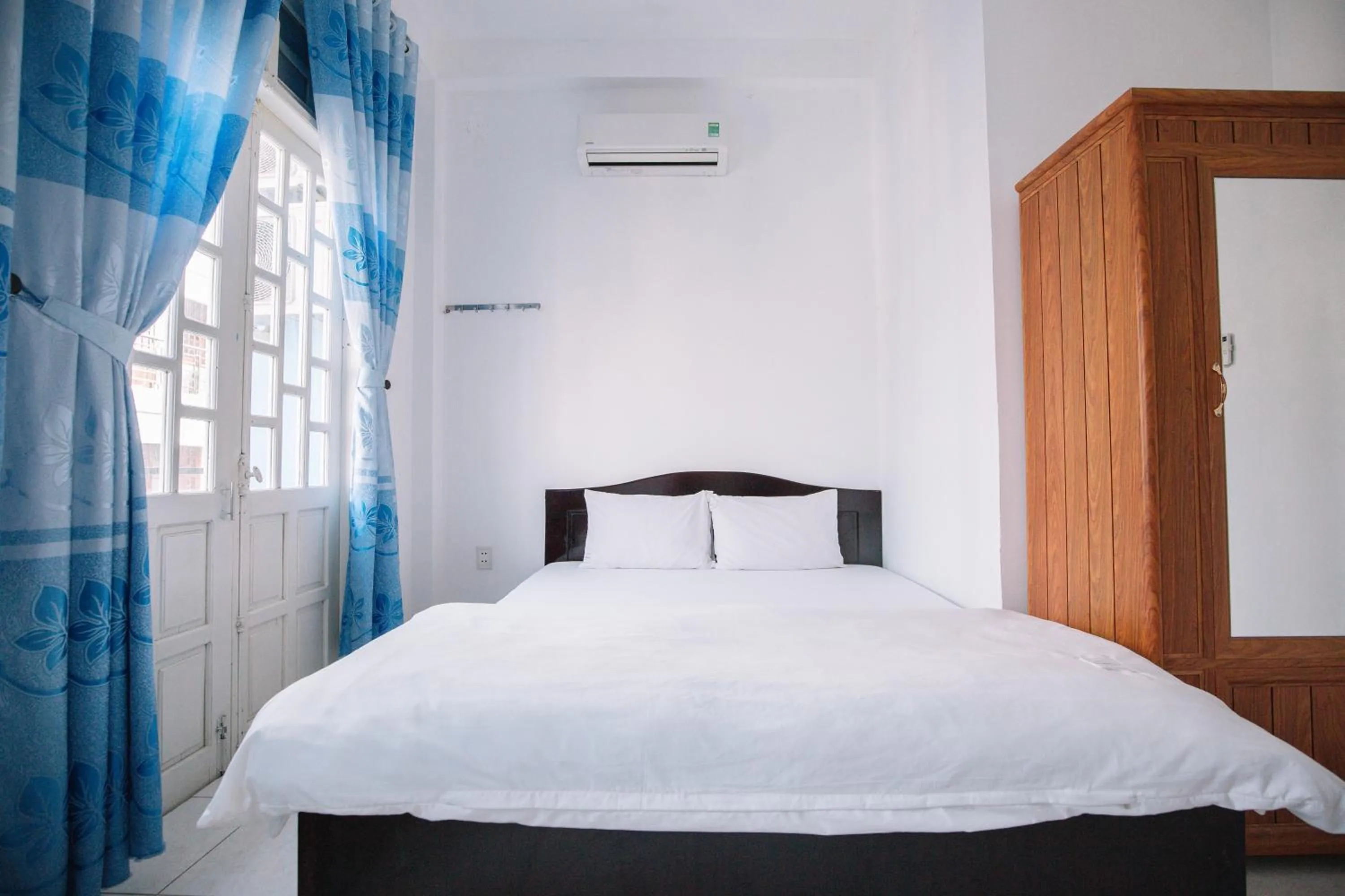 Bedroom, Bed in Lum Dong Tien Hotel