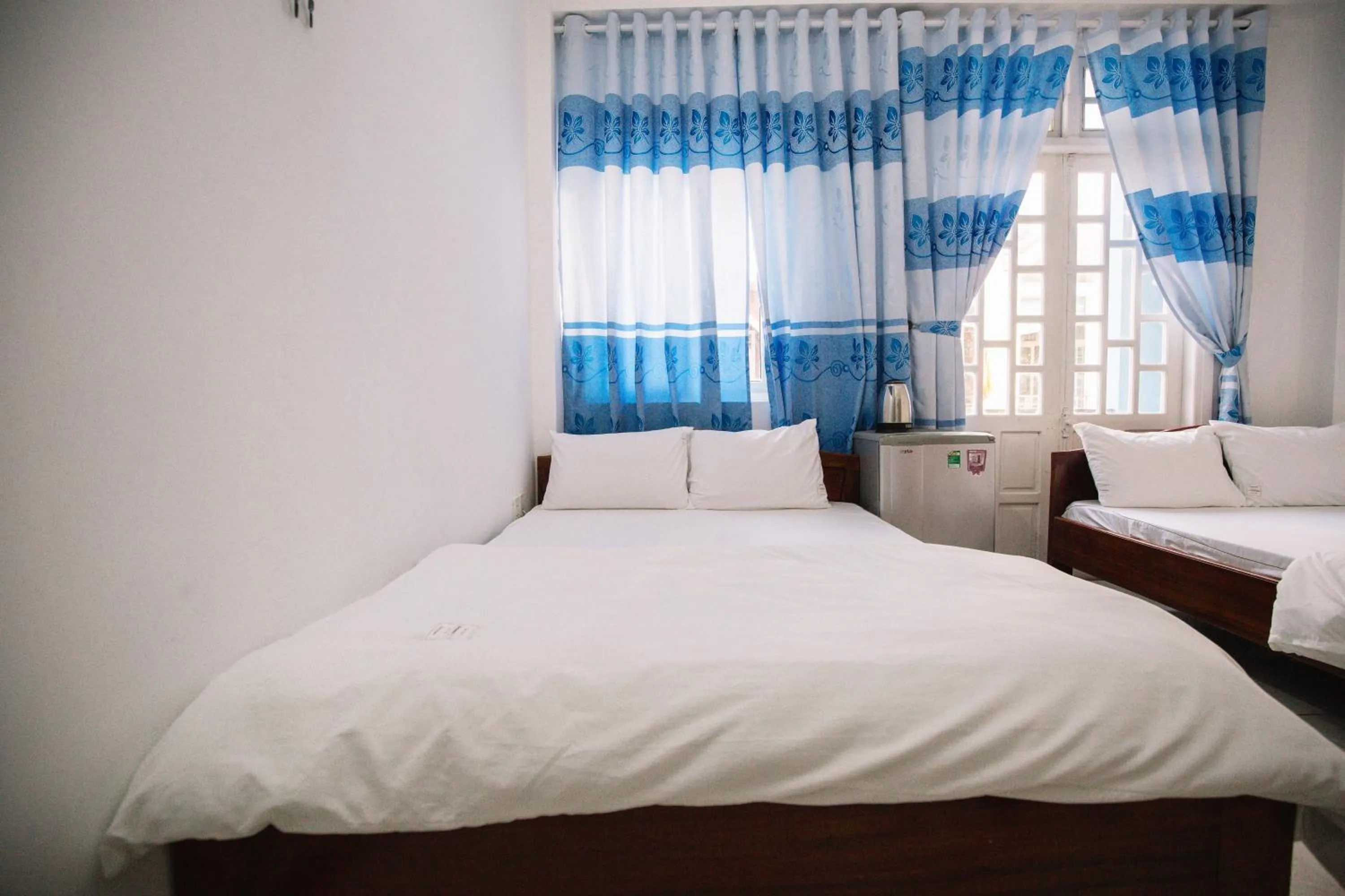 Bedroom, Bed in Lum Dong Tien Hotel