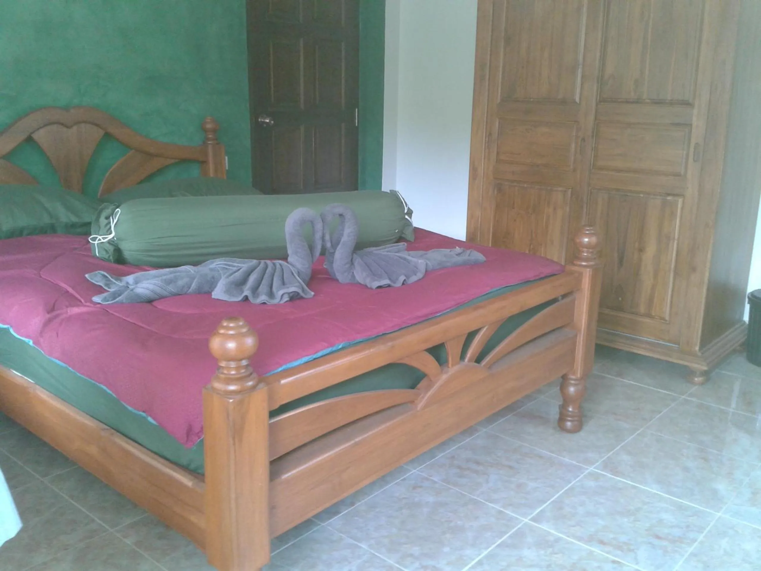 Decorative detail, Bed in Nananuira Apartment and Room