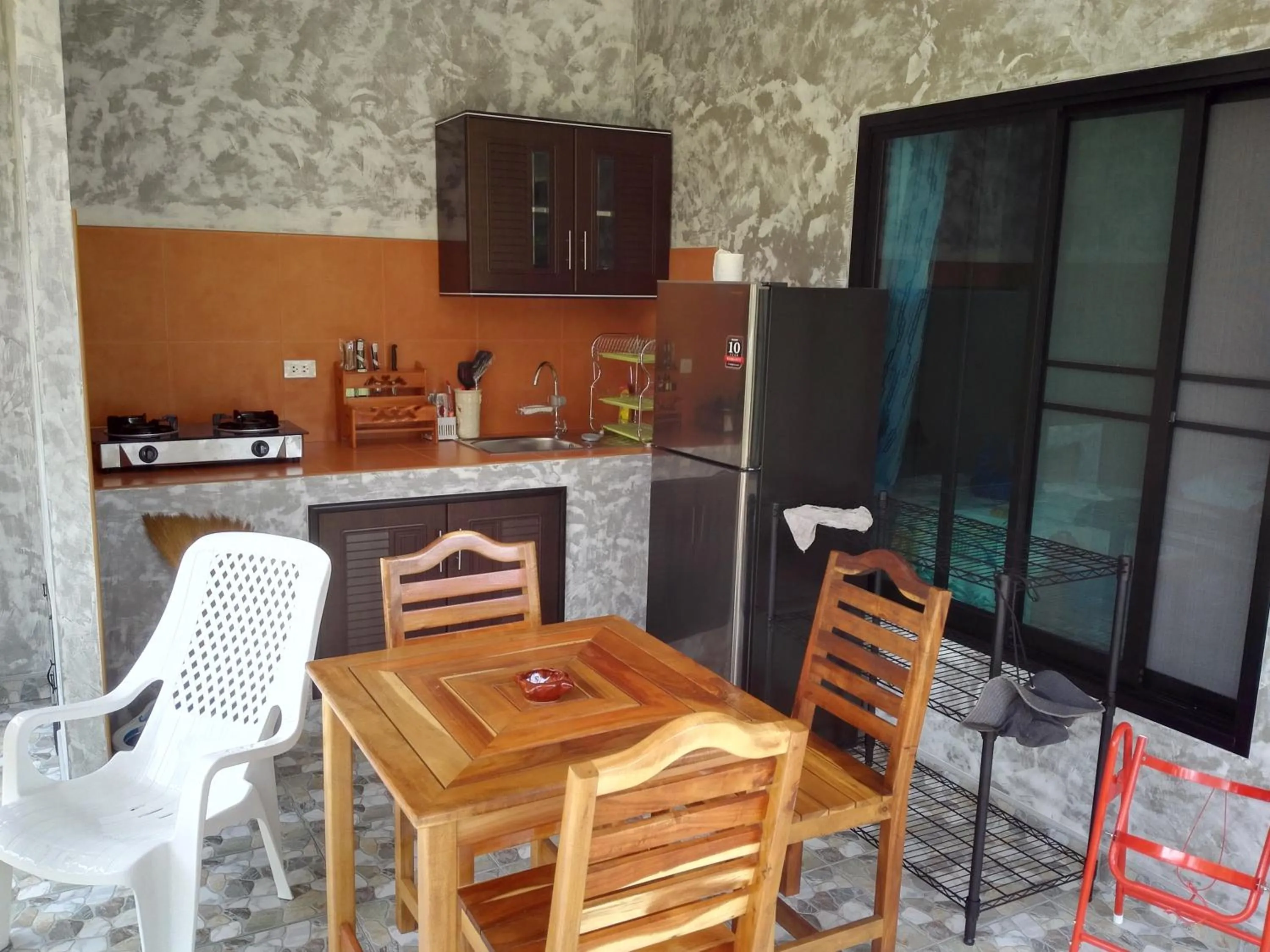 Kitchen or kitchenette in Nananuira Apartment and Room