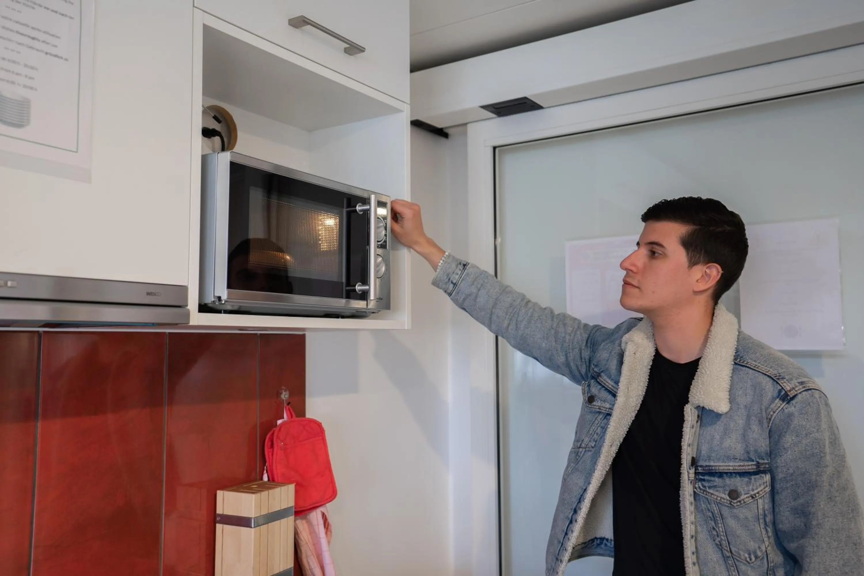Communal kitchen in Nyon Hostel