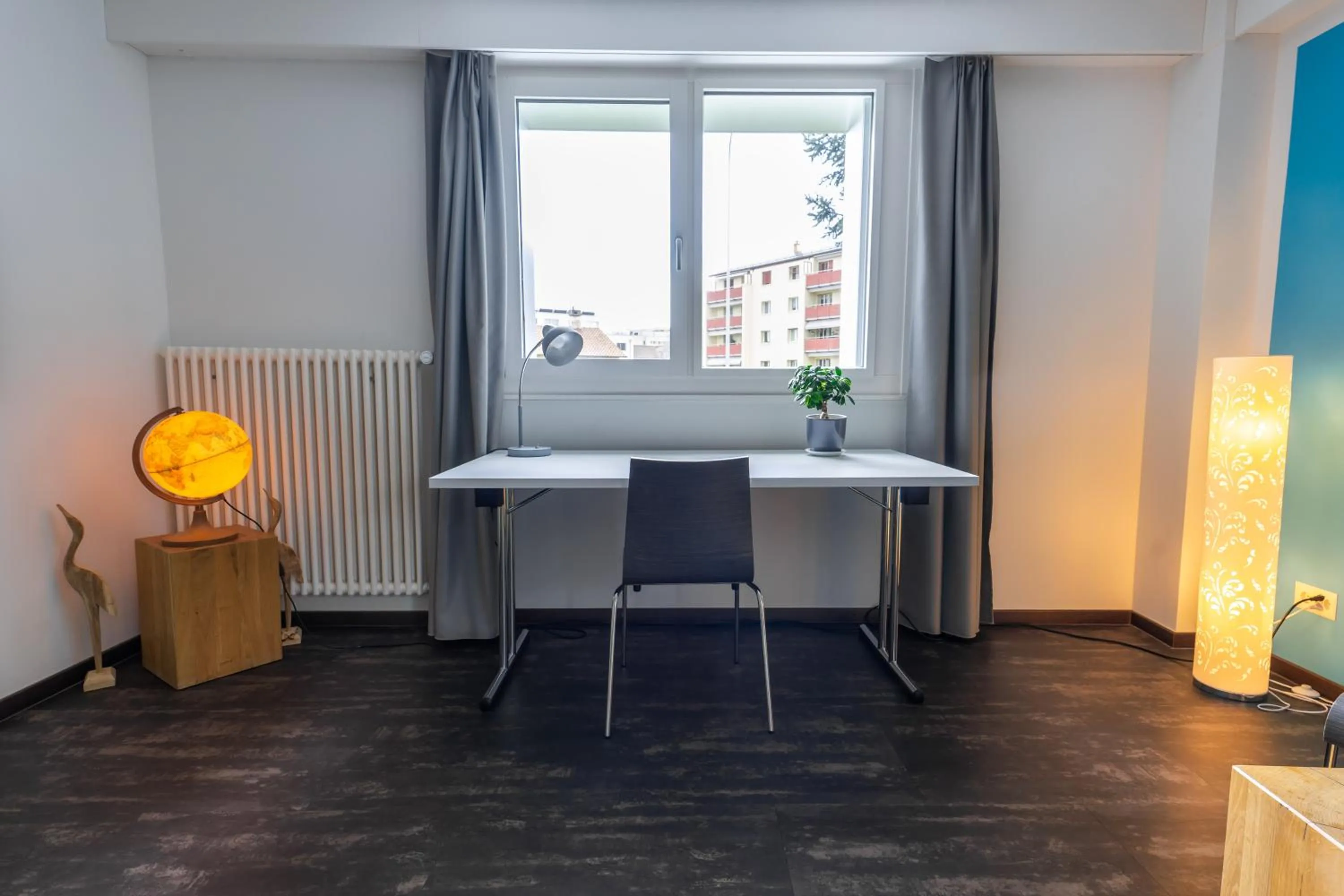 Communal lounge/ TV room in Nyon Hostel