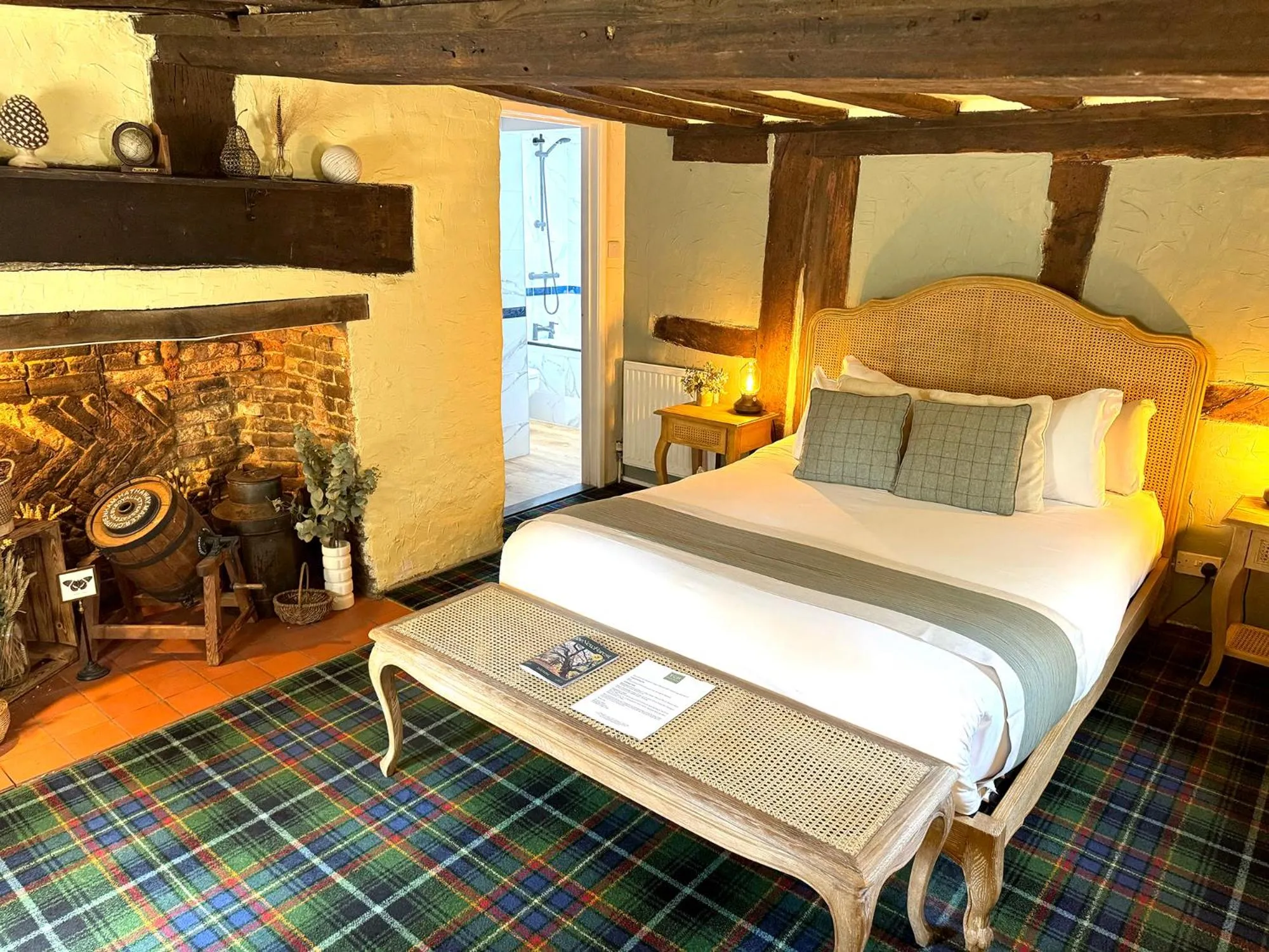 Bed in Thatched Cottage Hotel