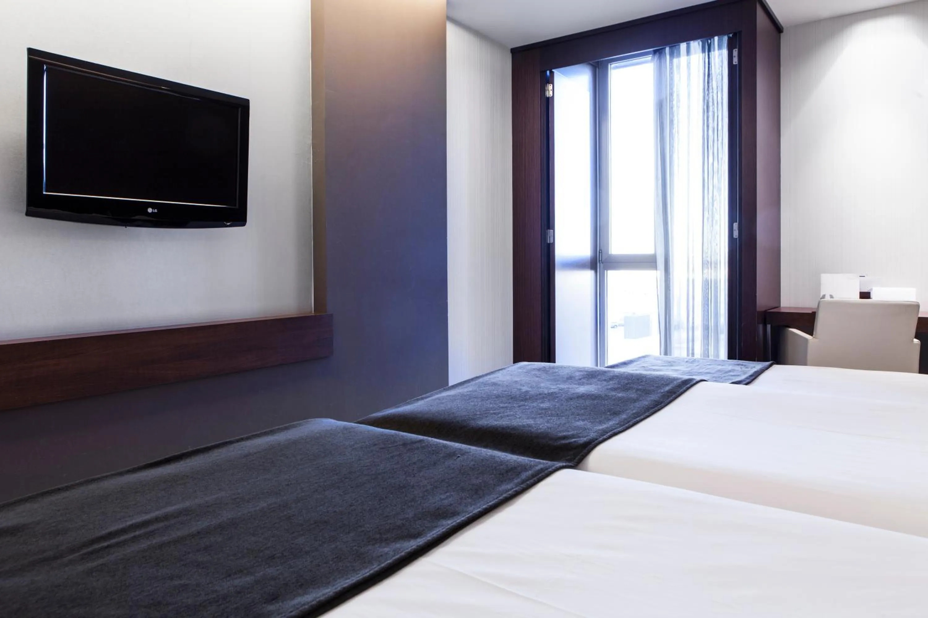 Bed in Hotel Diagonal Plaza