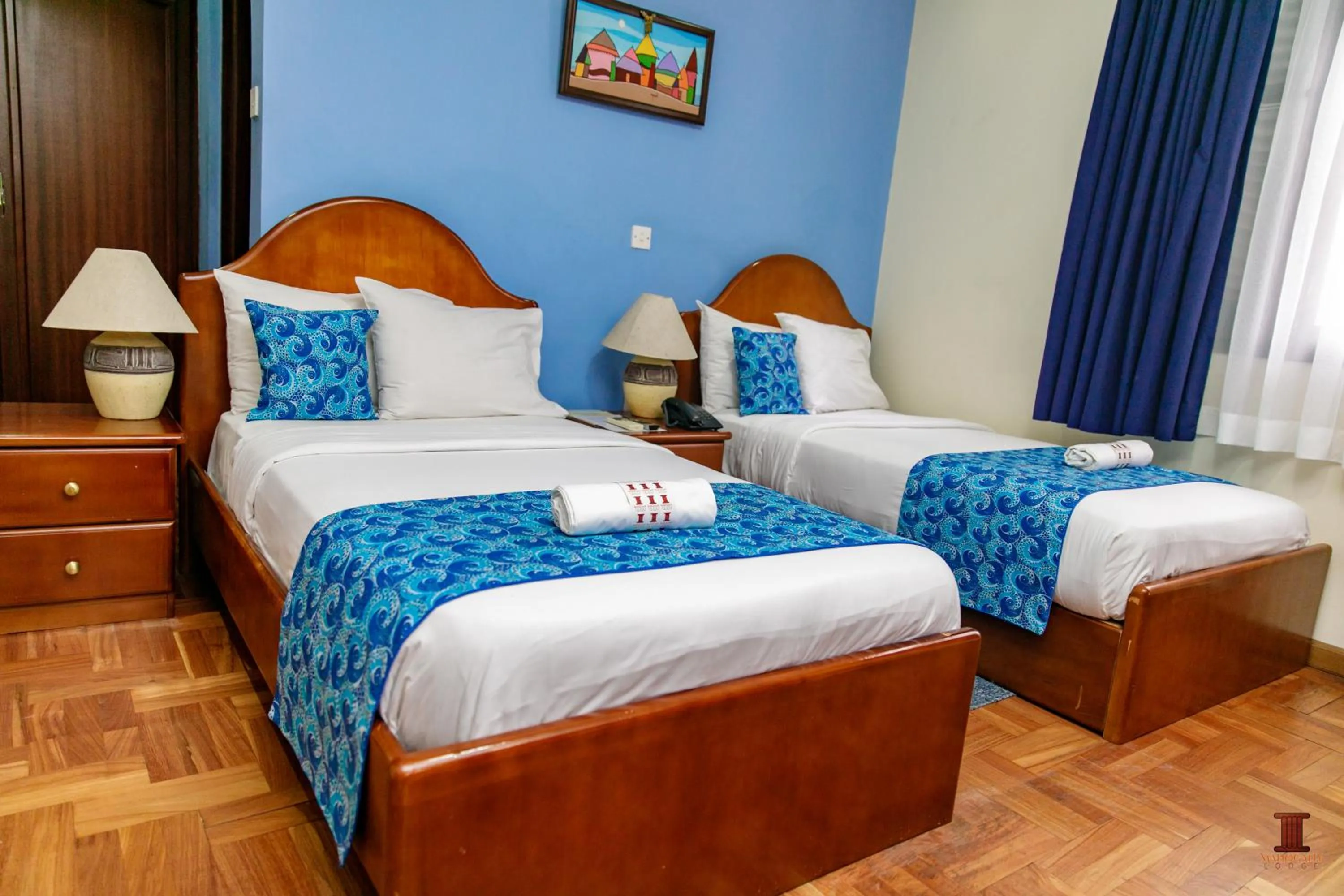 Bed in Mahogany Lodge, Cantonments