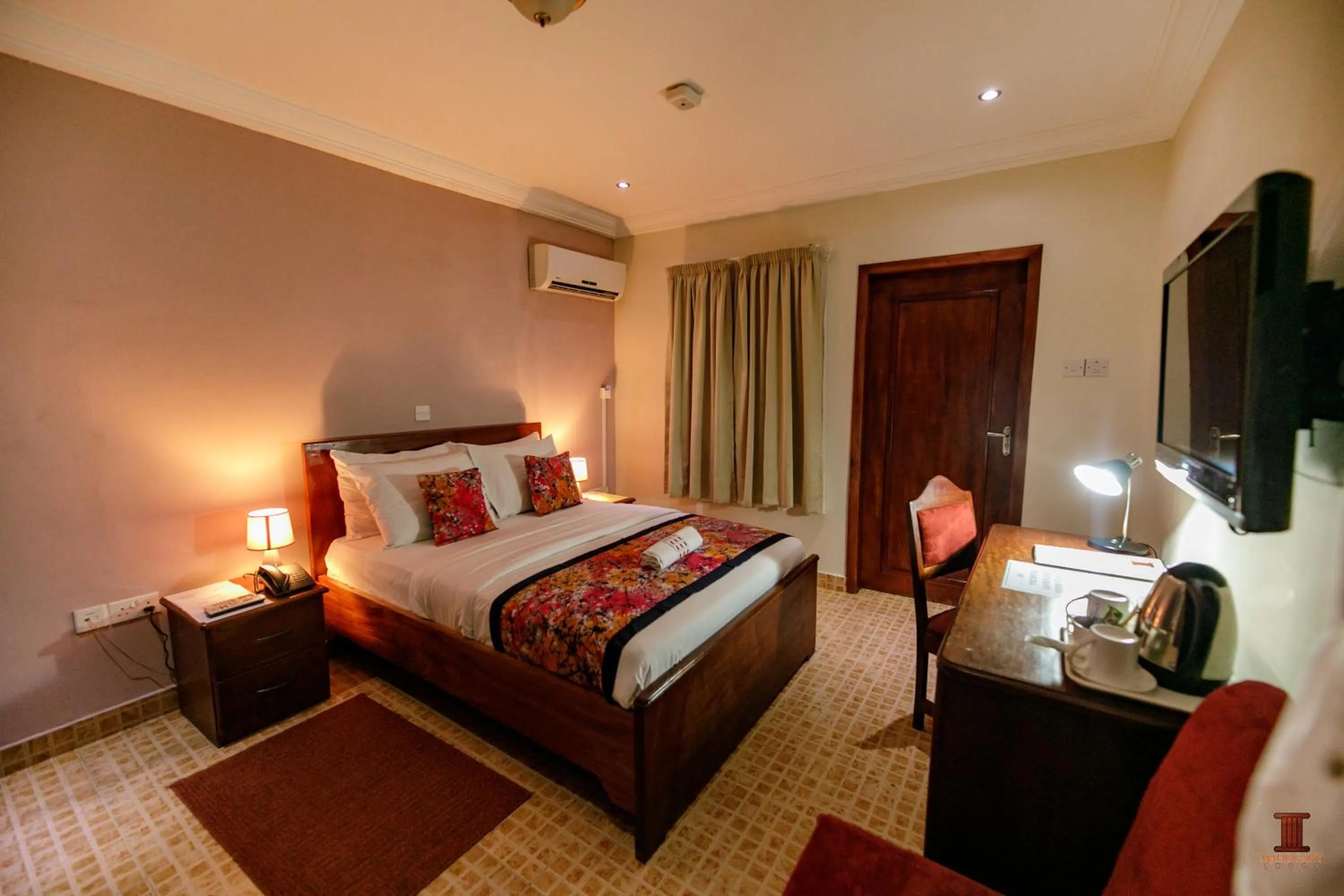 Bed in Mahogany Lodge, Cantonments