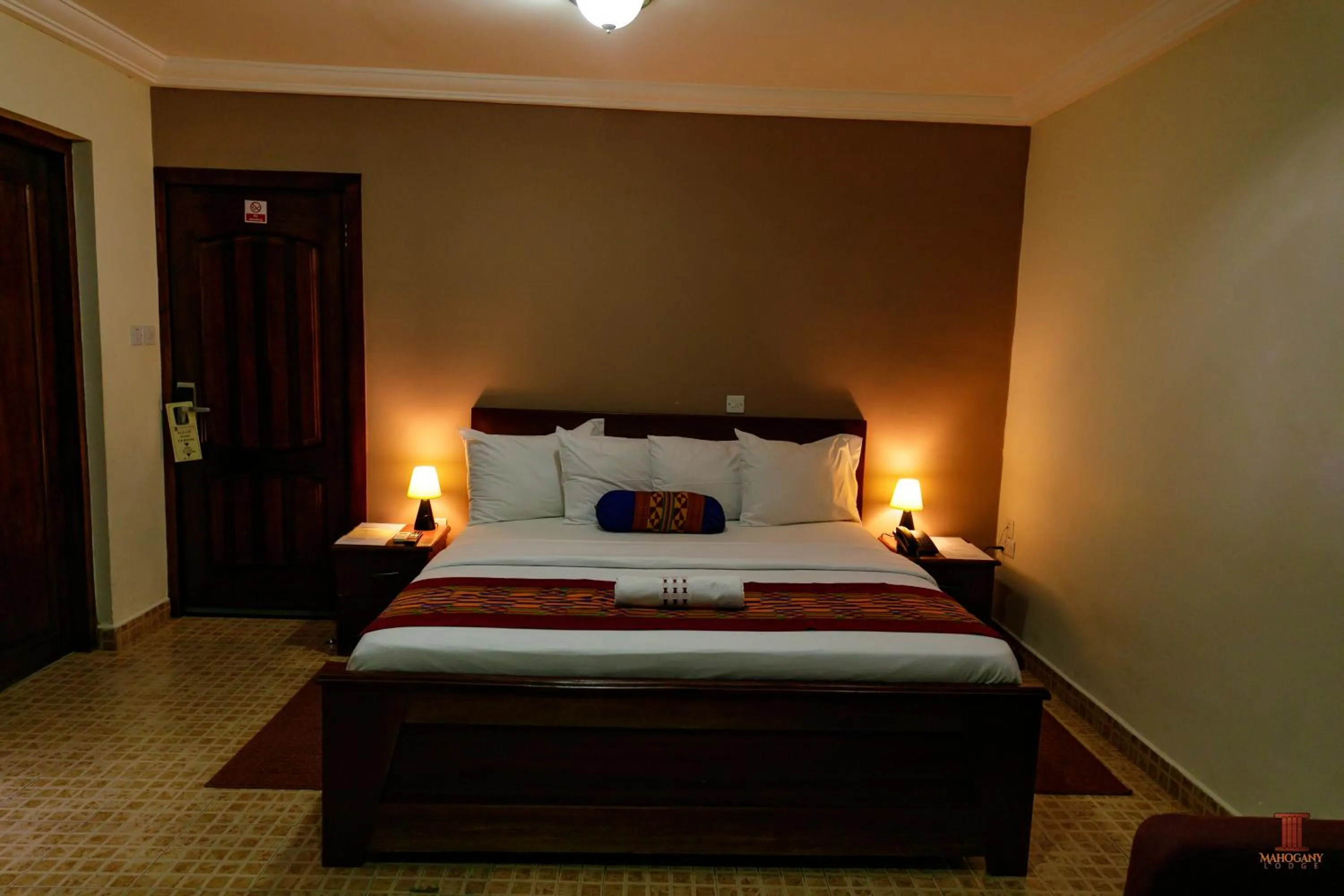 Bed in Mahogany Lodge, Cantonments