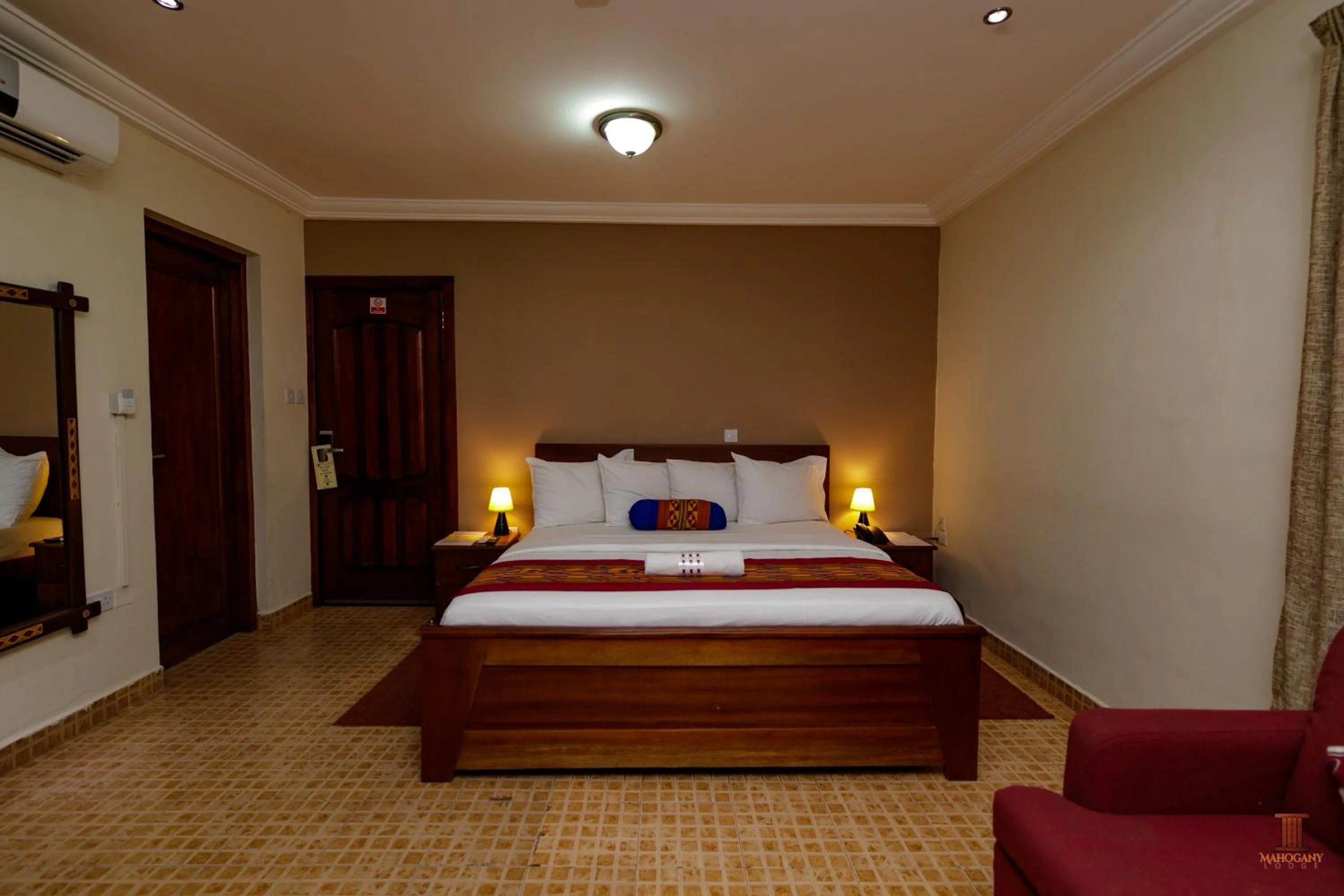 Bed in Mahogany Lodge, Cantonments