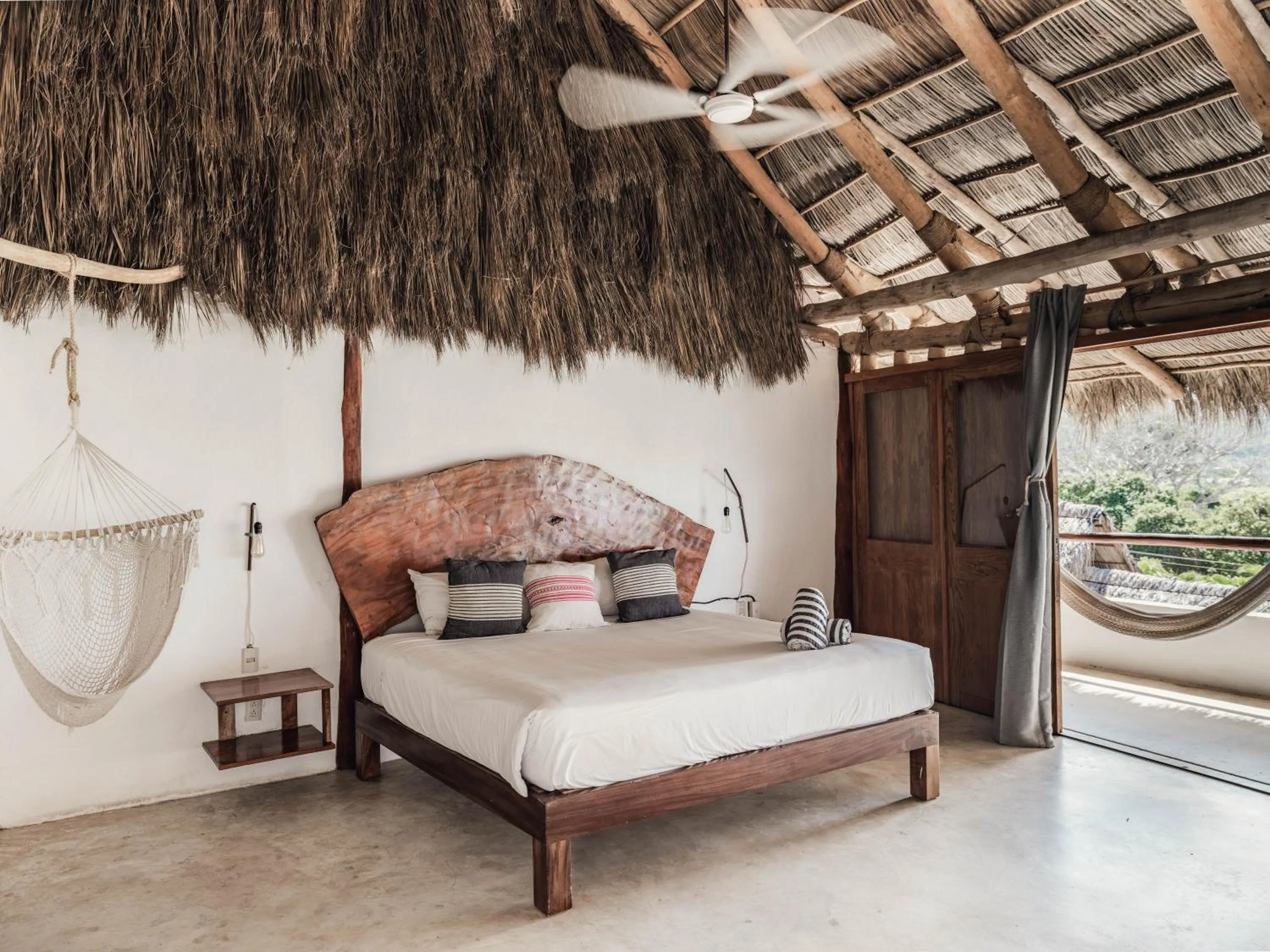 Bed in Maraica San Pancho Rooms