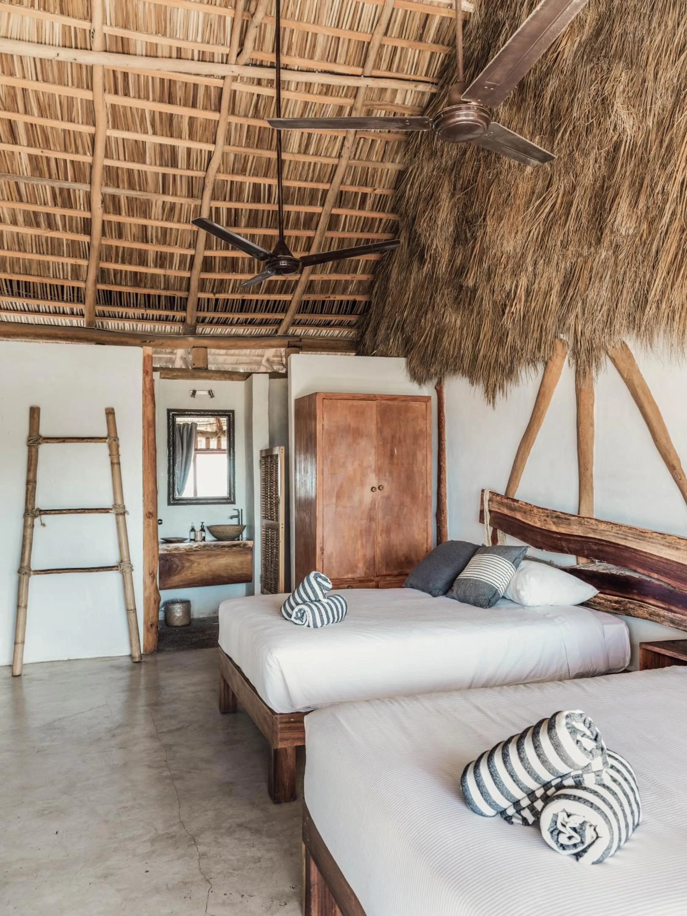 Bed in Maraica San Pancho Rooms