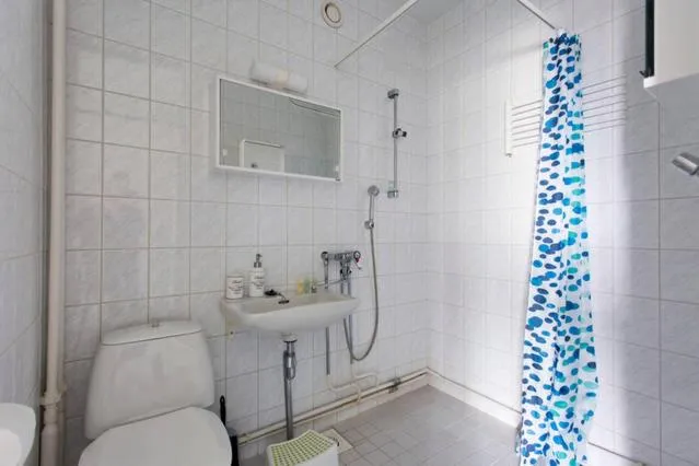 Bathroom in Seaside Downtown Apartment with private parking