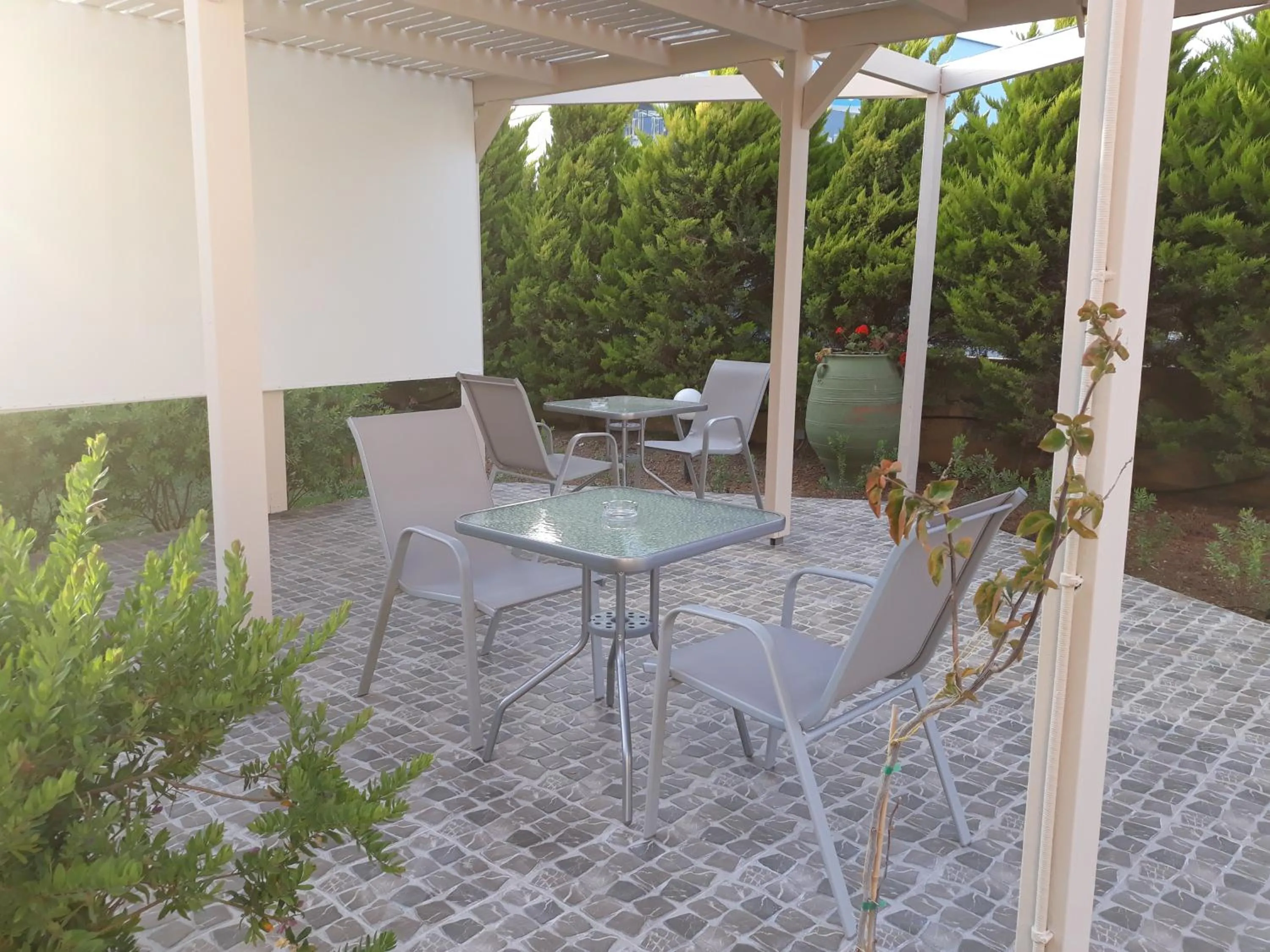Communal lounge/ TV room in The Santo George Beach Resort