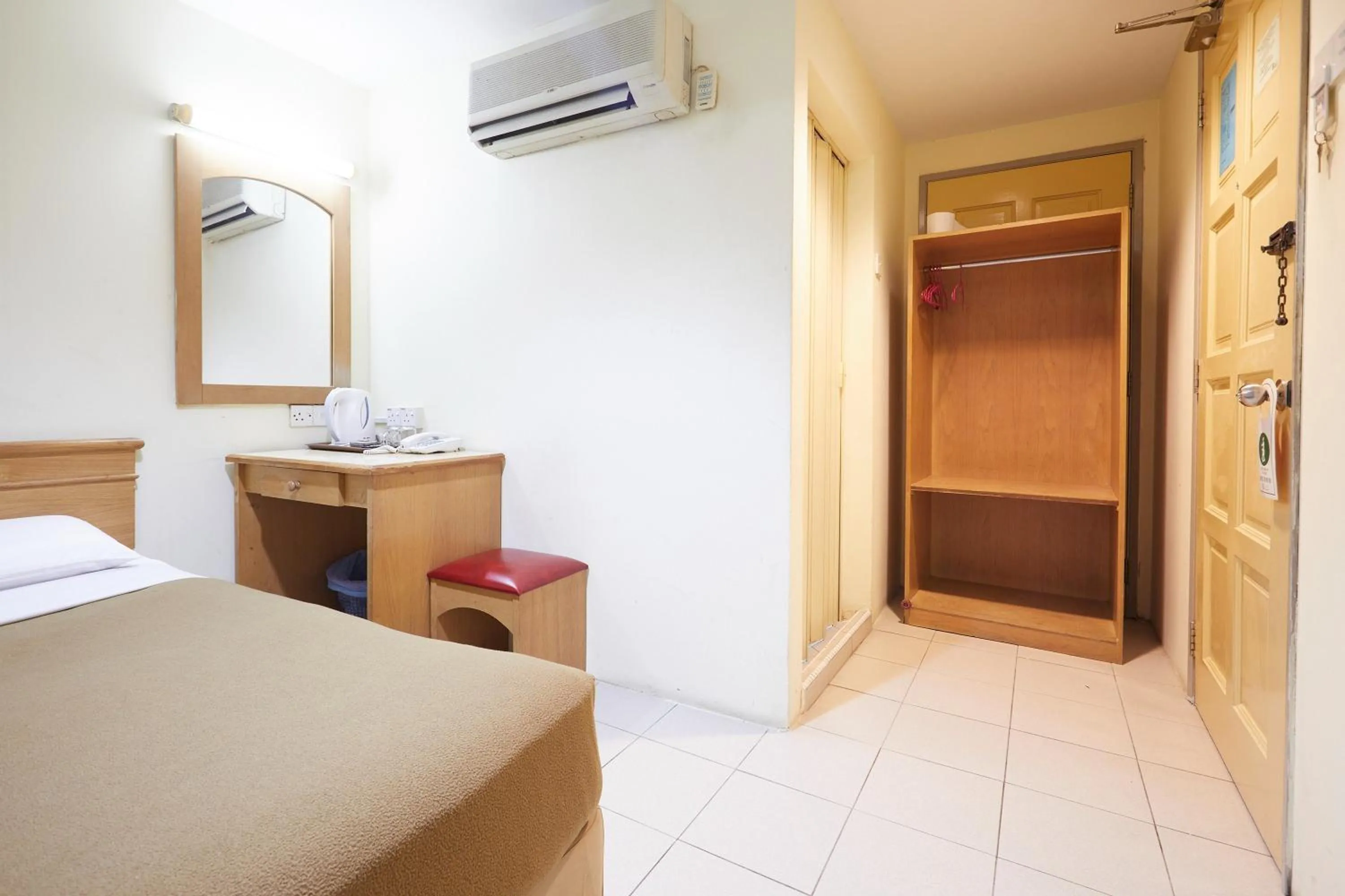 Bedroom, Bed in Tang City Hotel, Petaling Street, Merdeka PNB 118 Tower