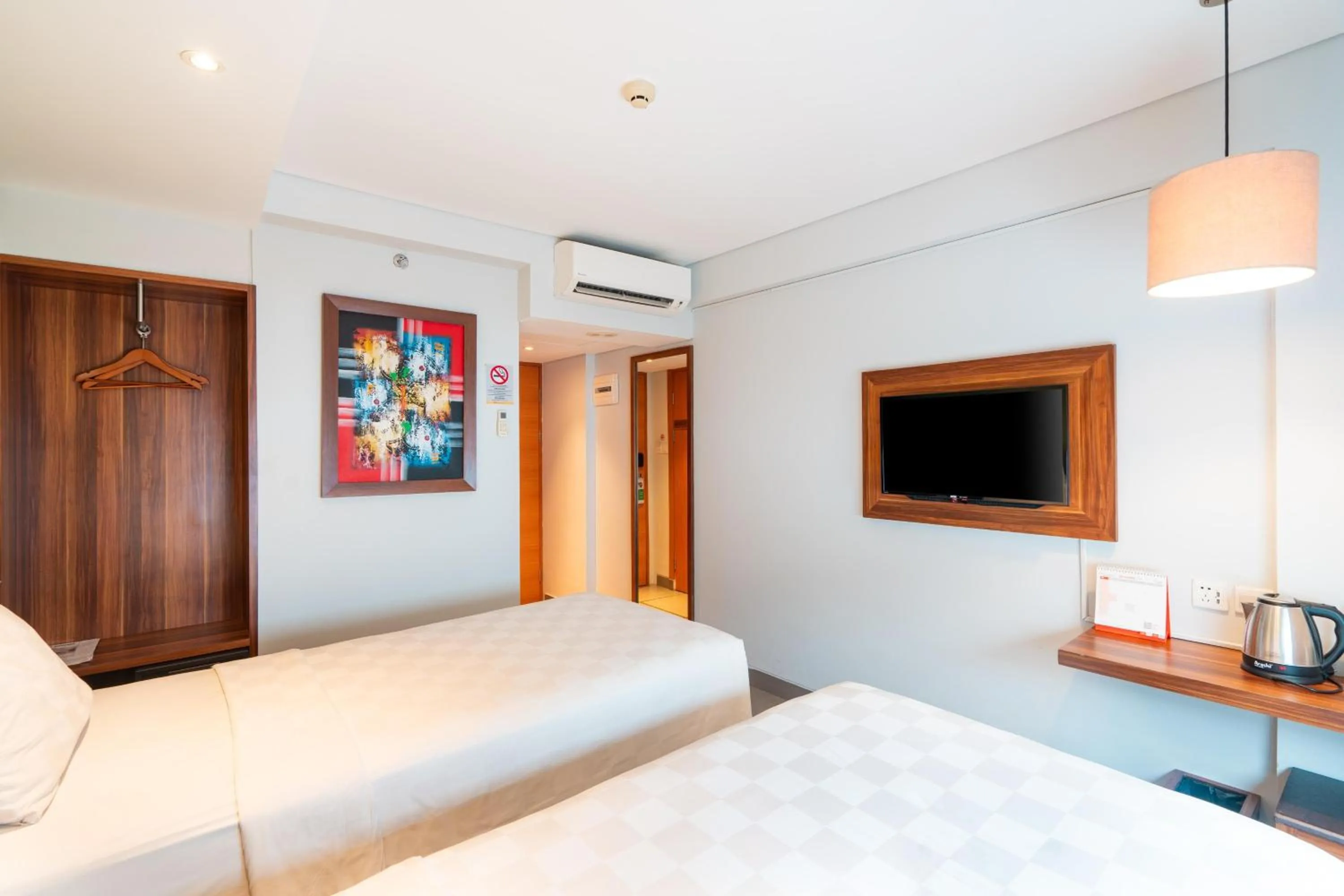 Bed in Swiss-Belexpress Kuta Legian