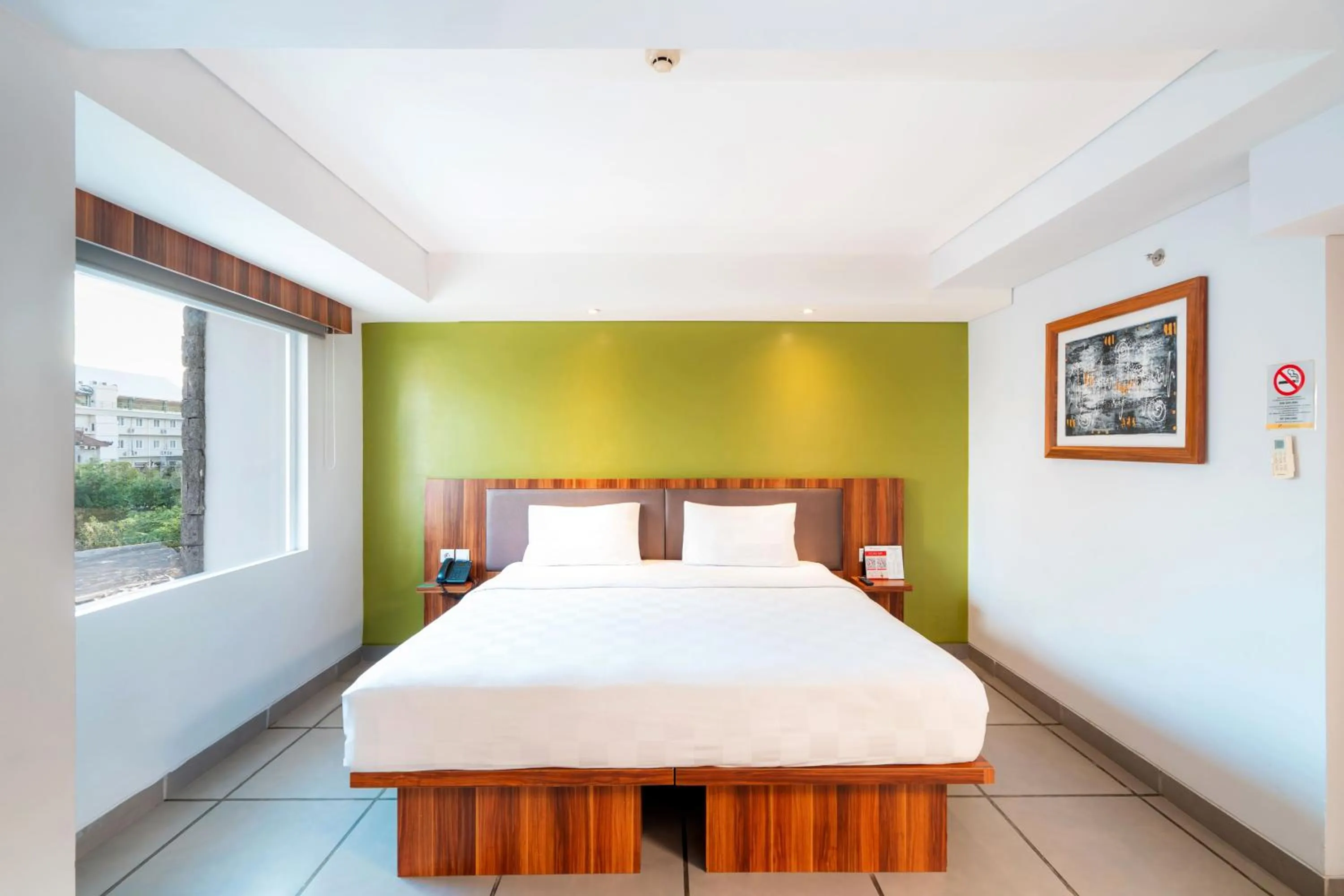 Bed in Swiss-Belexpress Kuta Legian