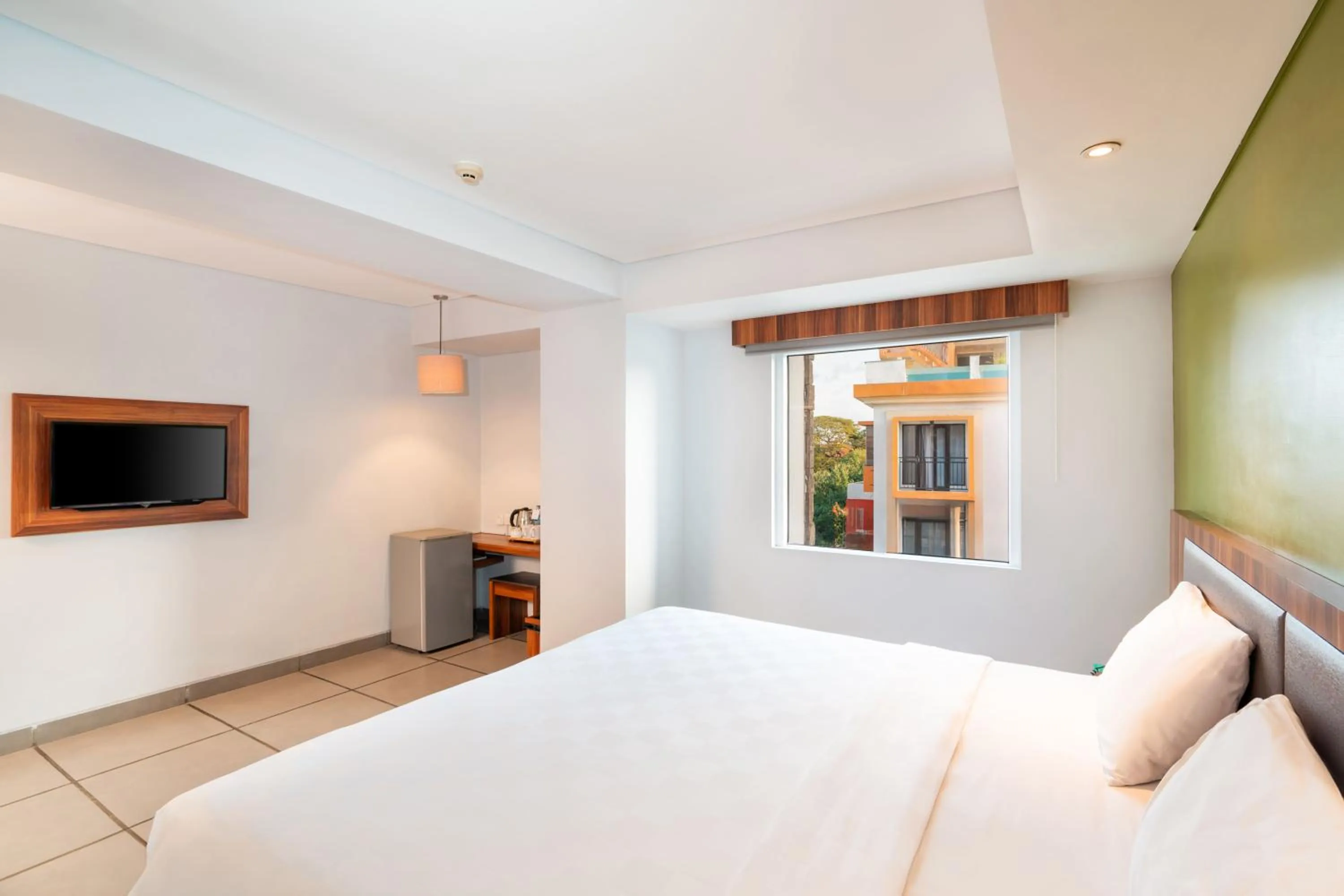 Bed in Swiss-Belexpress Kuta Legian