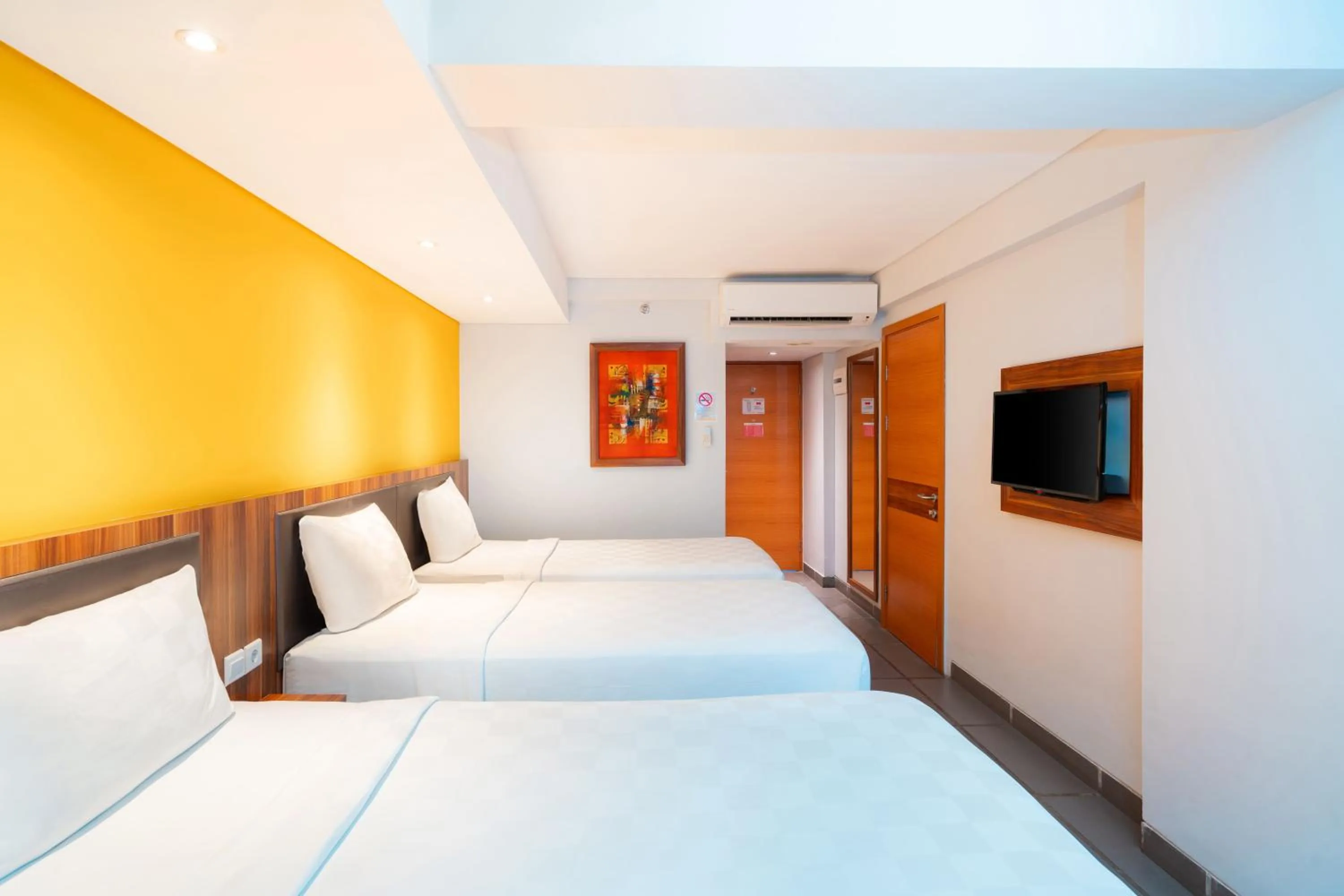 Bed in Swiss-Belexpress Kuta Legian