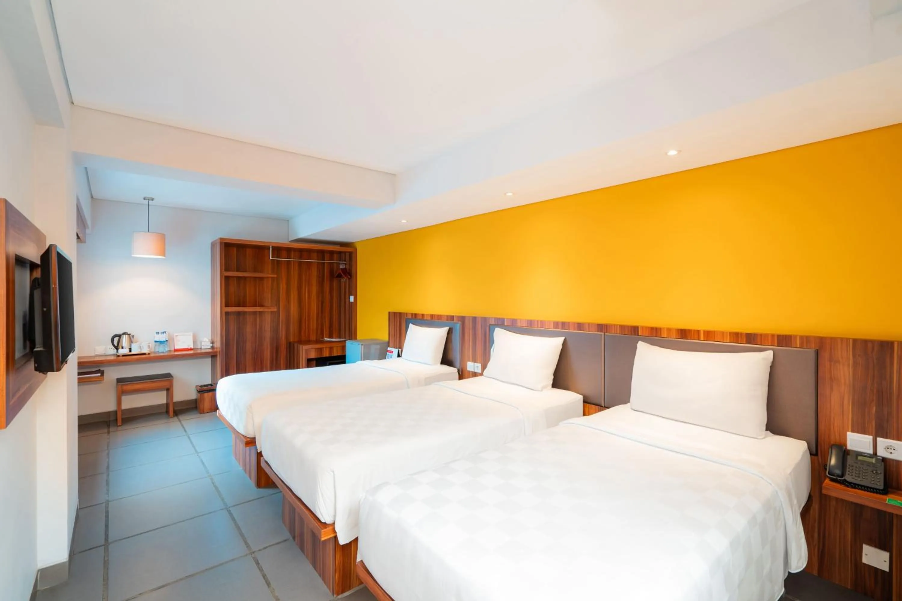 Bed in Swiss-Belexpress Kuta Legian
