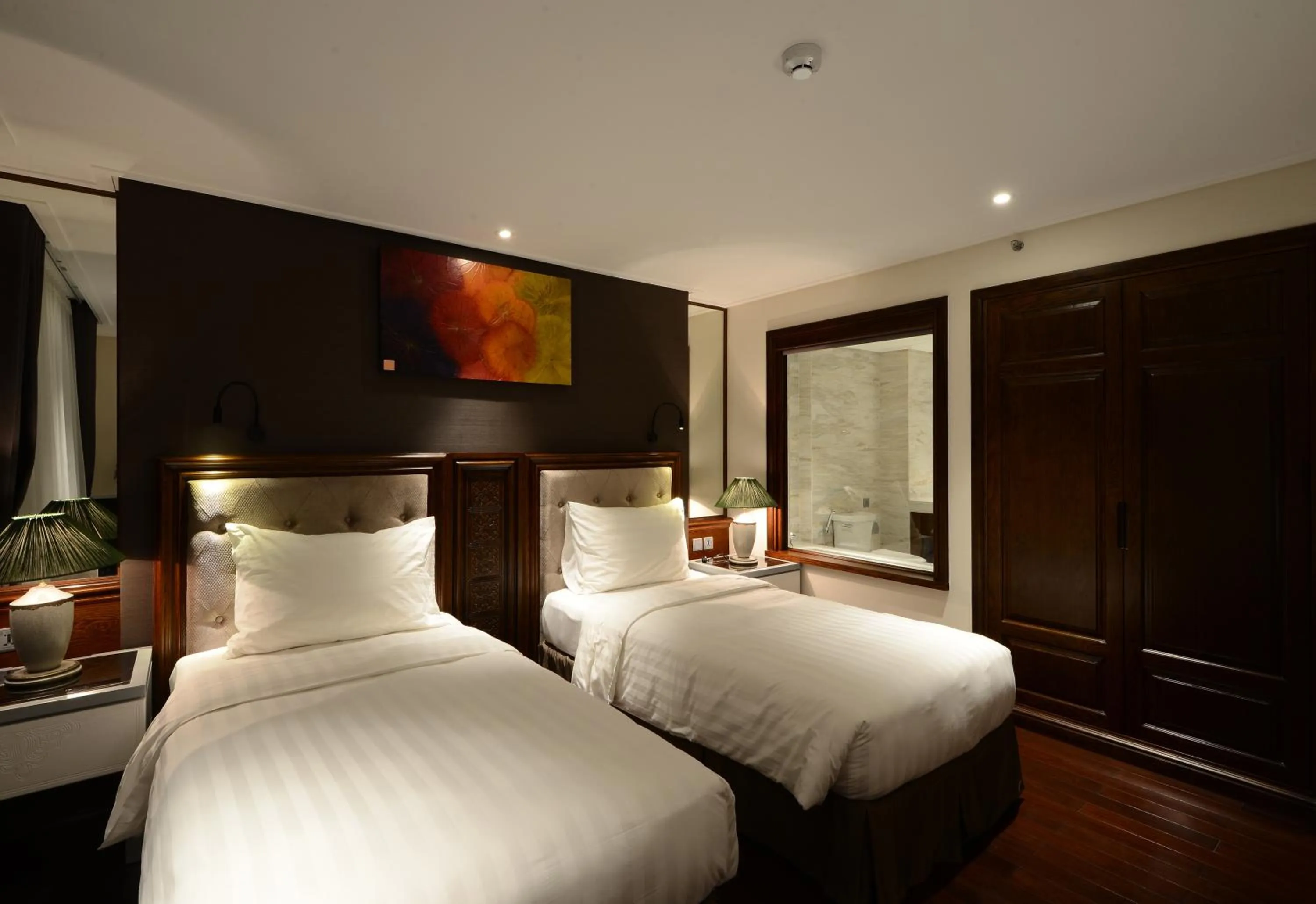 Bed in The Chi Boutique Hotel