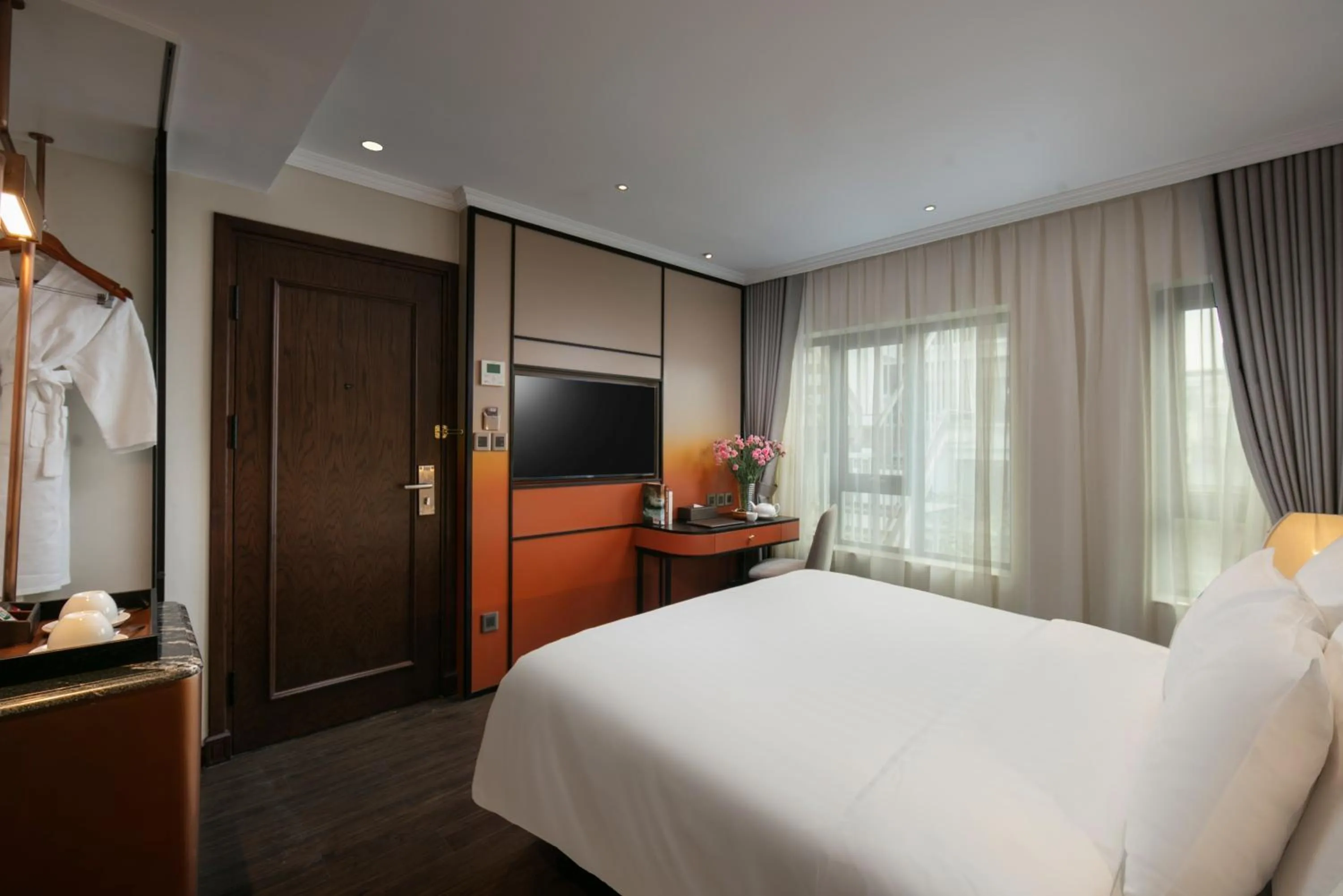 Bed in The Chi Boutique Hotel