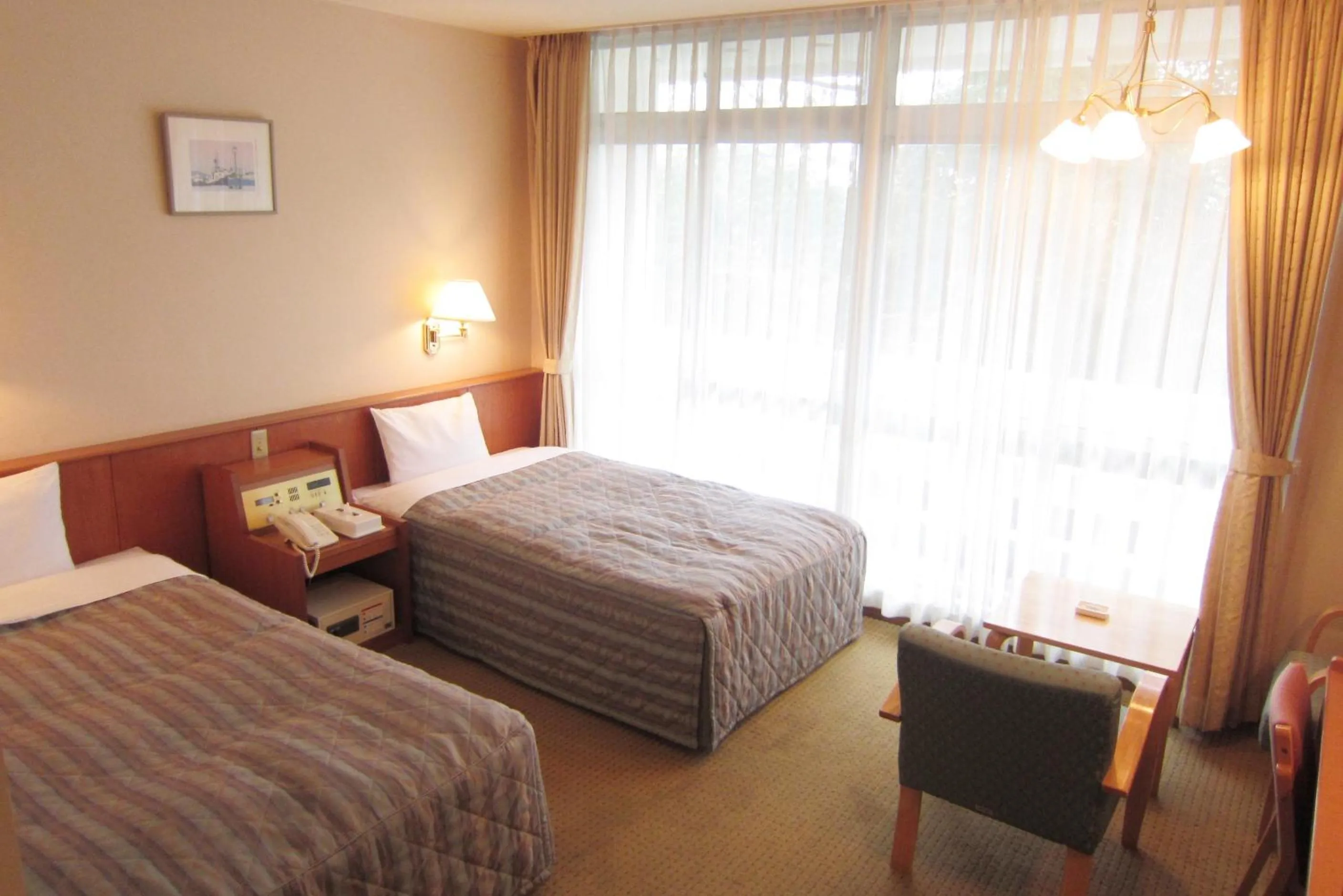 Photo of the whole room, Bed in Hotel Axia Kushikino