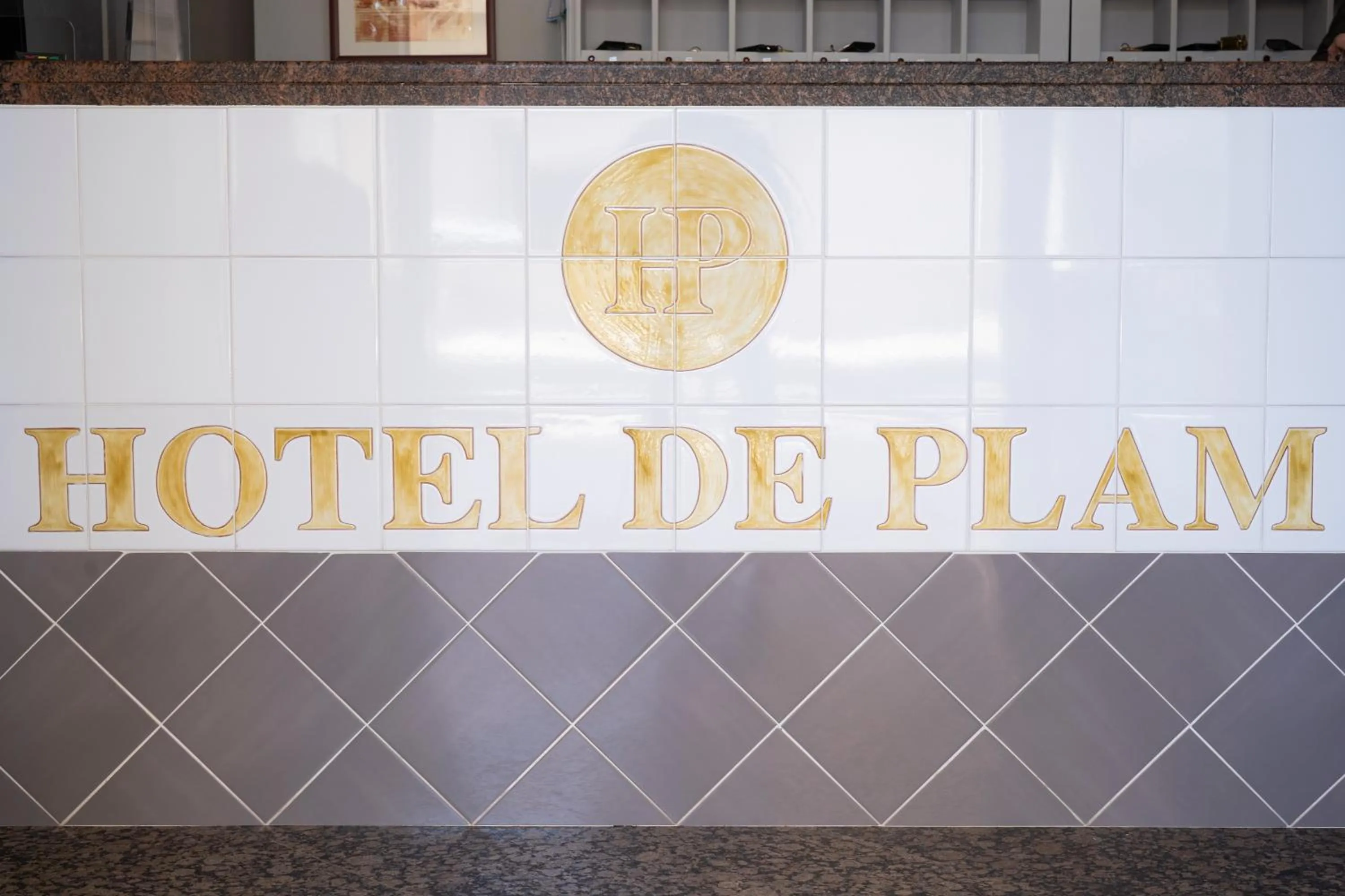 Property logo or sign in Hotel De Plam