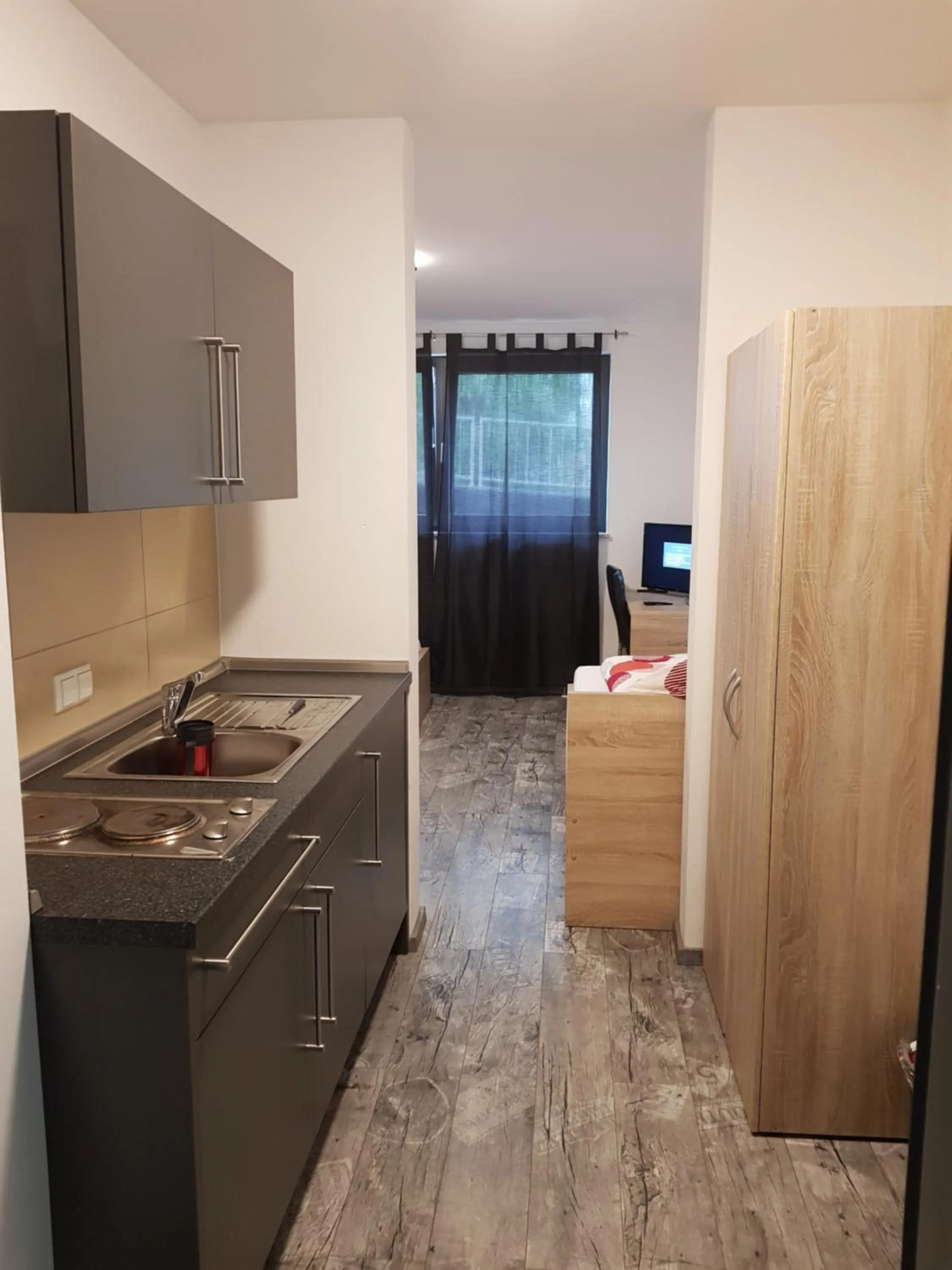 Kitchen or kitchenette in Sunny´s Hotel & Residence