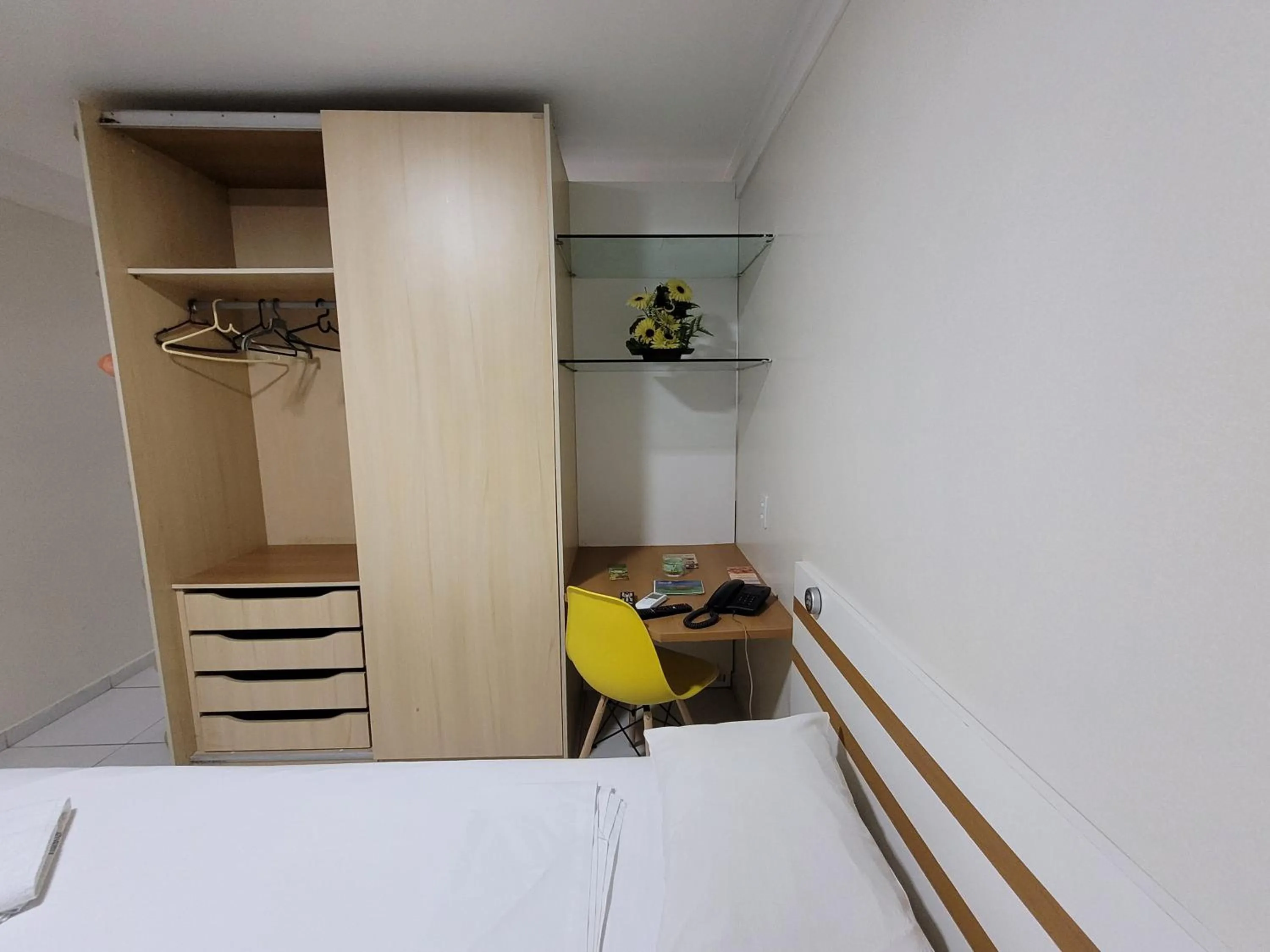 wardrobe in Hotel Victory Business Flat Beira Mar Tambaú