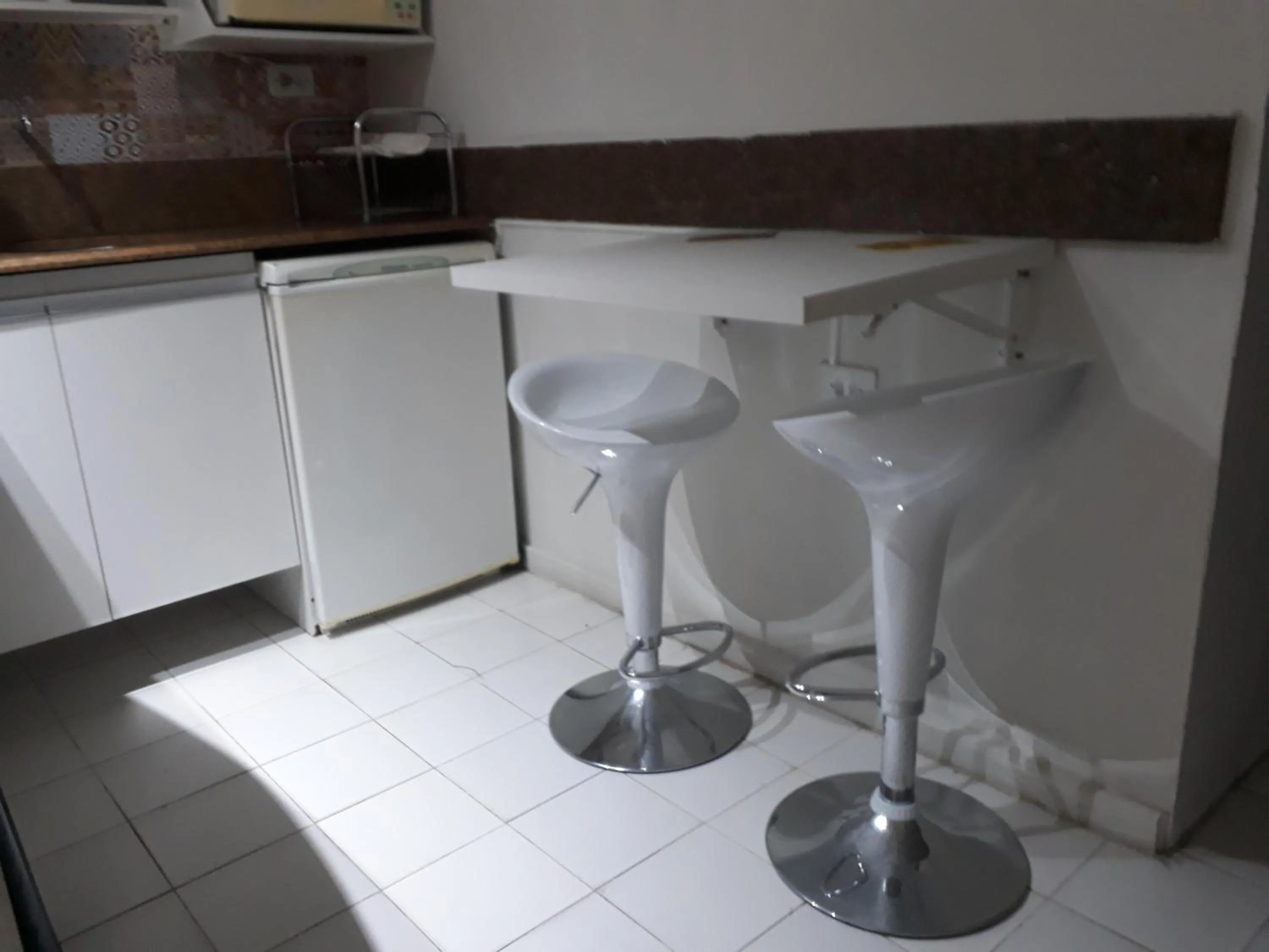 Kitchen or kitchenette in Hotel Victory Business Flat Beira Mar Tambaú