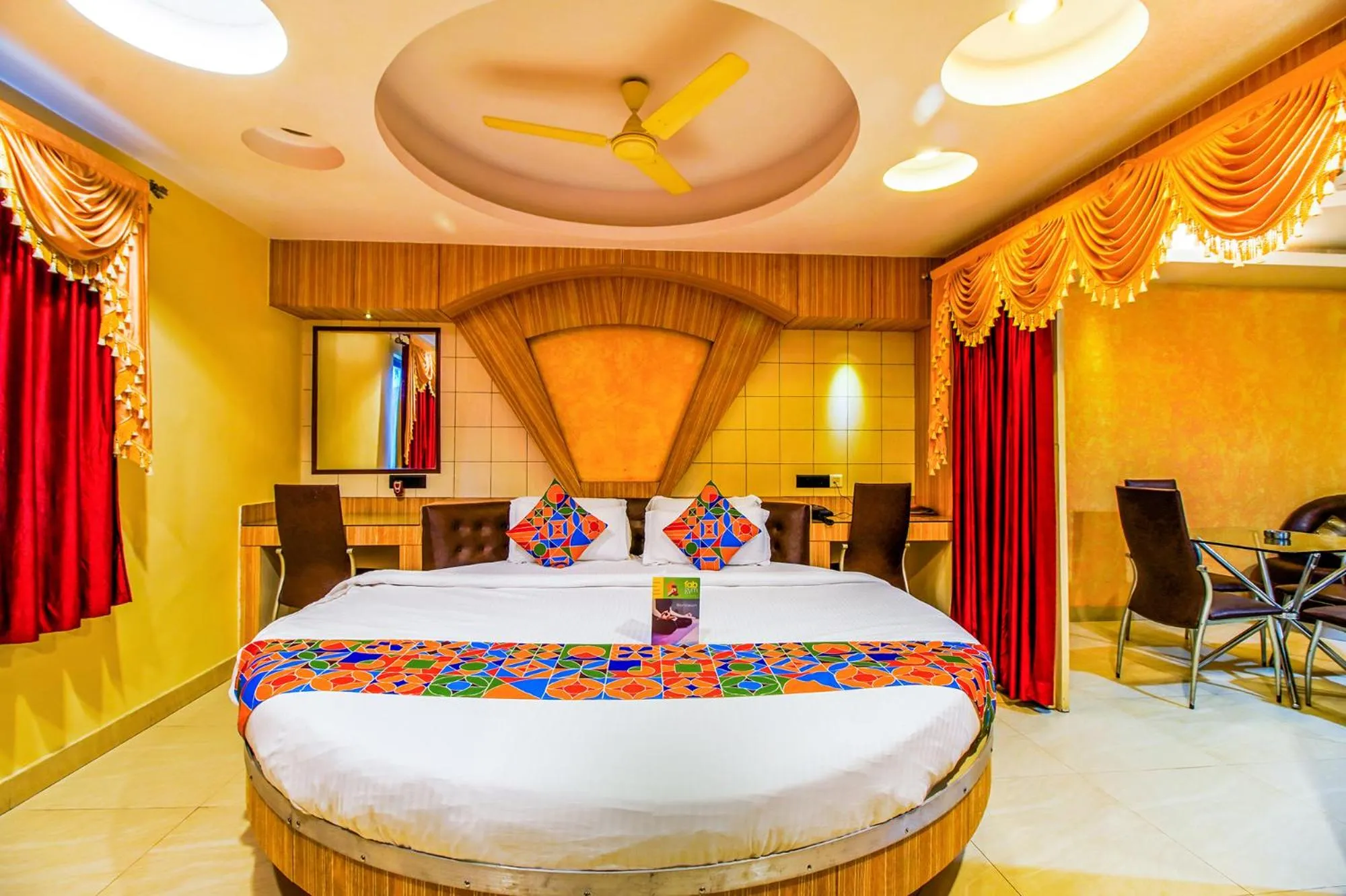 Seating area, Bed in FabHotel Palash Residency Ranchi Railway Station