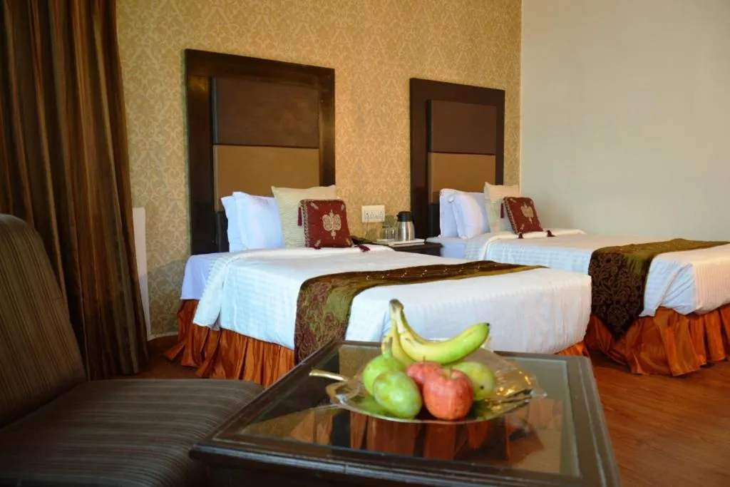 Photo of the whole room, Bed in The Ambassador - Hotel & Conference Center