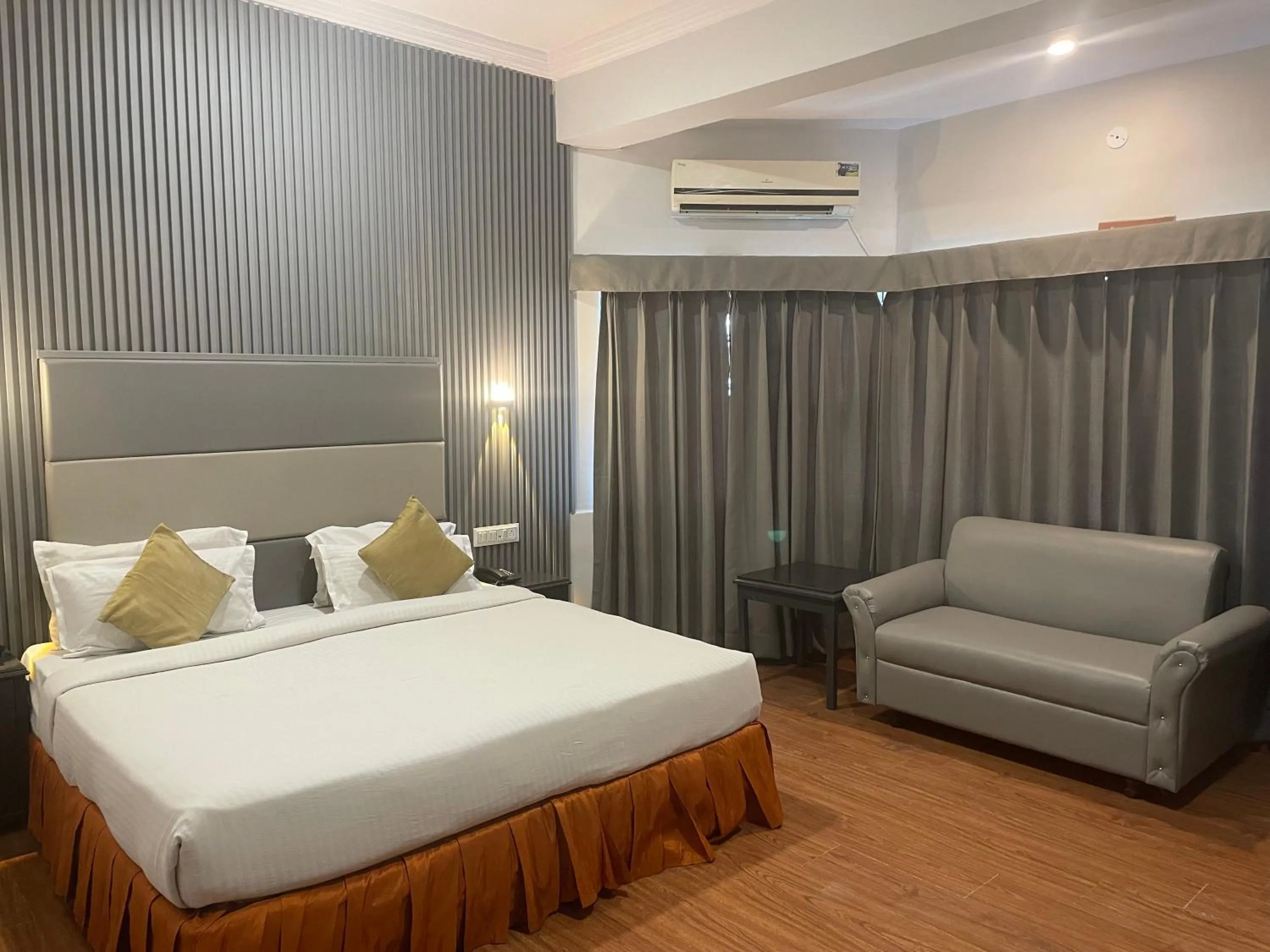 Bed in The Ambassador - Hotel & Conference Center