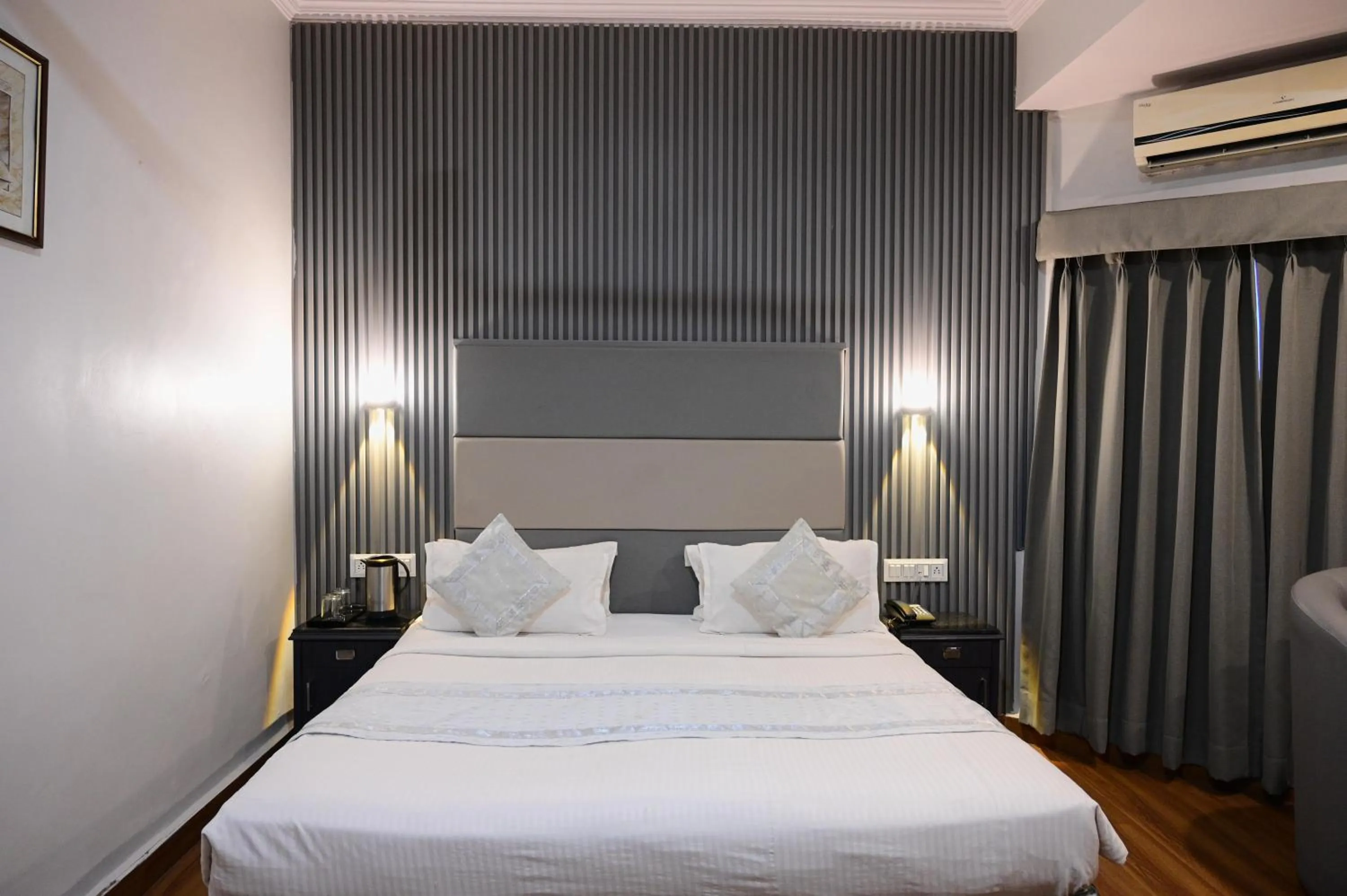 Bed in The Ambassador - Hotel & Conference Center