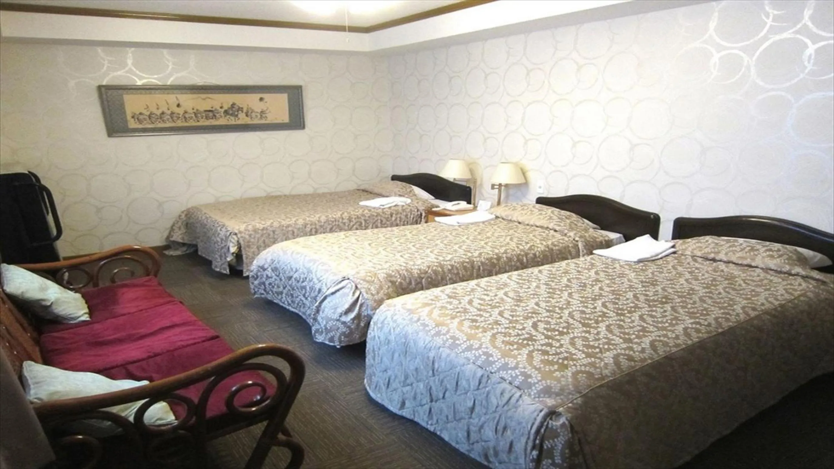 Photo of the whole room, Bed in Sunrise Hotel Okinawa-どこか懐かしいレトロ宿軽朝食付