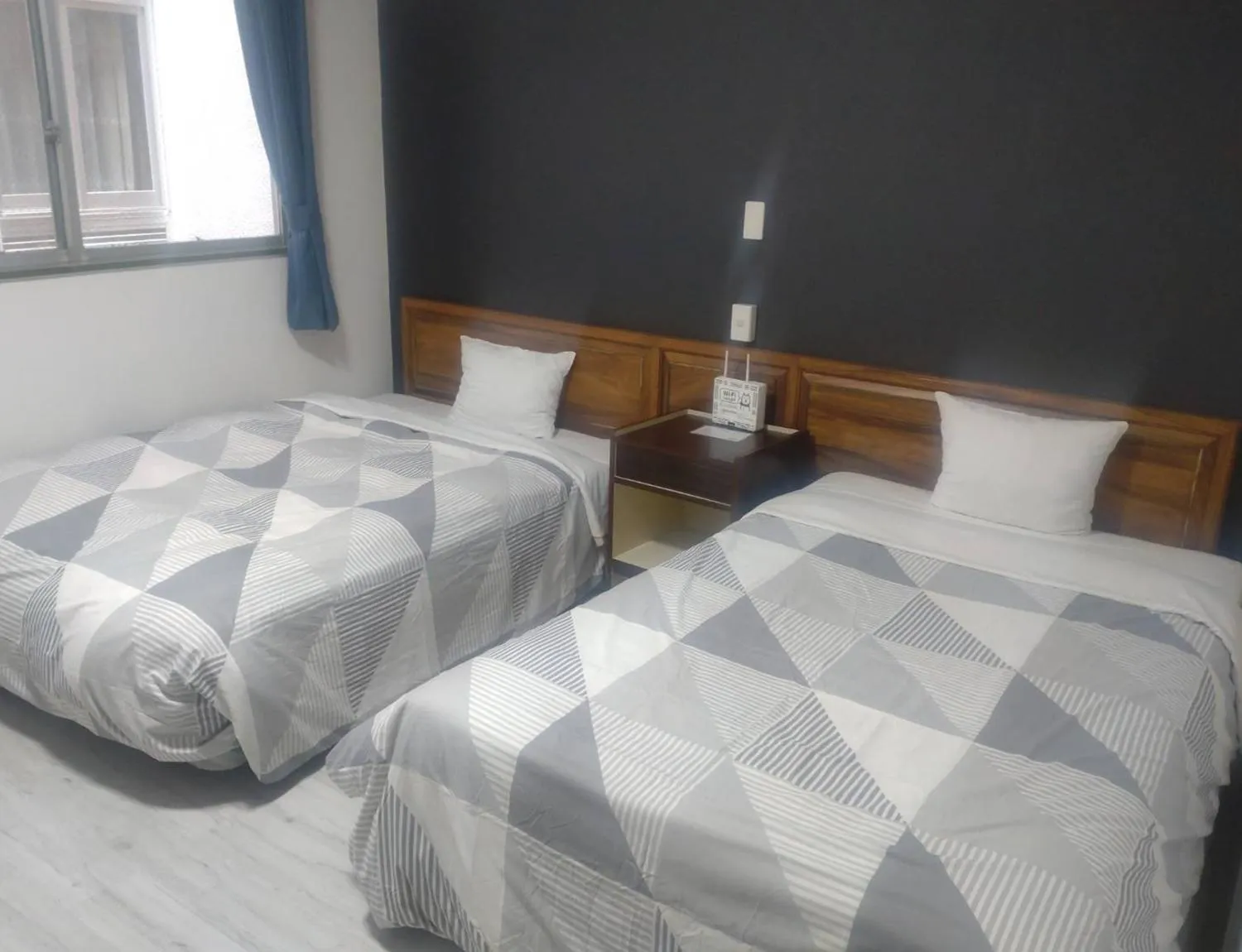 Bed in Sunrise Hotel Okinawa-どこか懐かしいレトロ宿軽朝食付