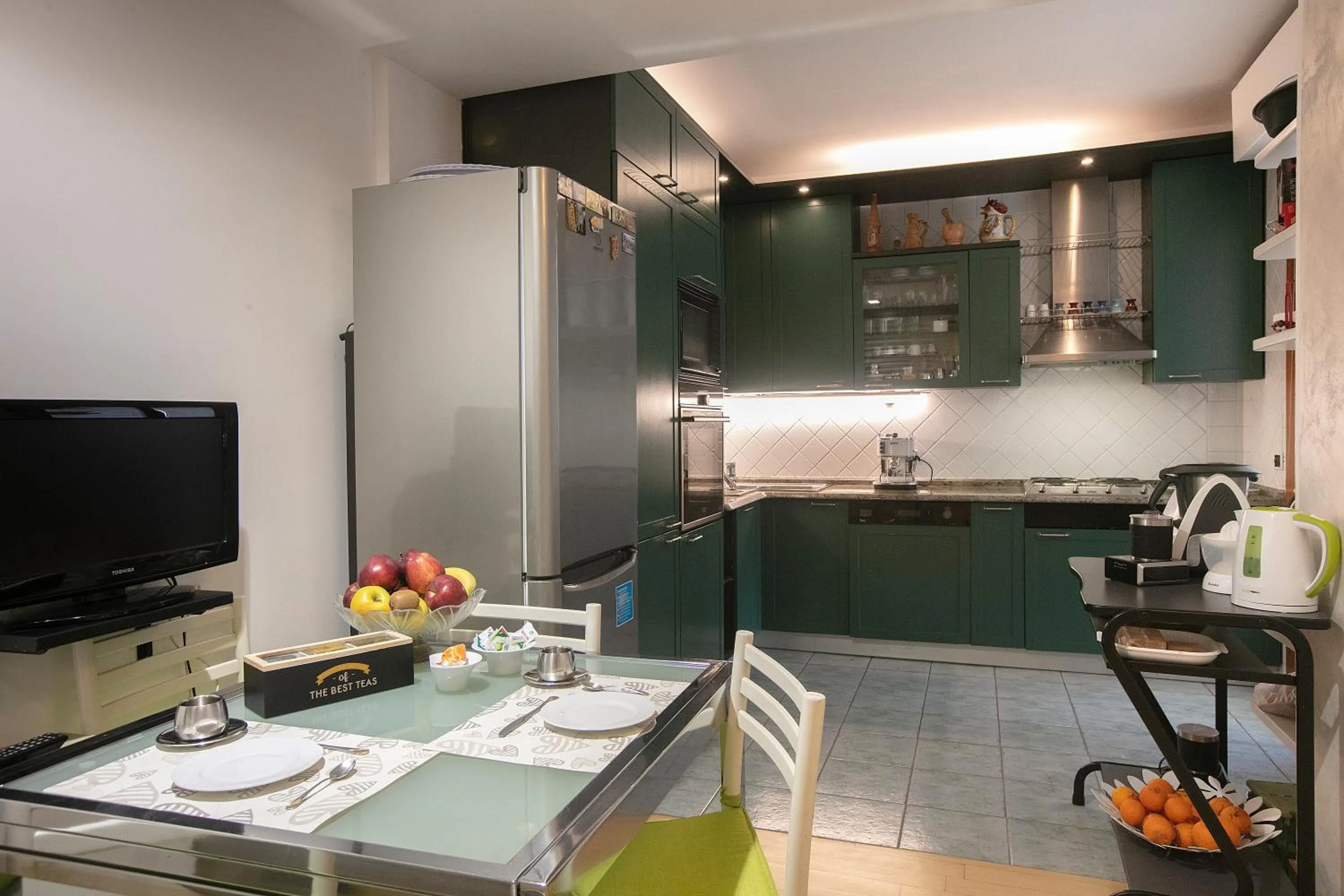 Kitchen or kitchenette in Giardini e Mare