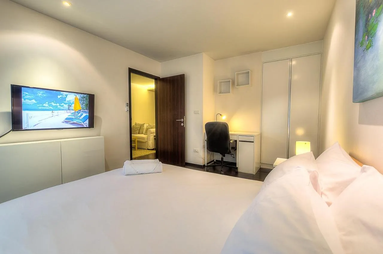 Photo of the whole room, Bed in The Title Comfort Condotel